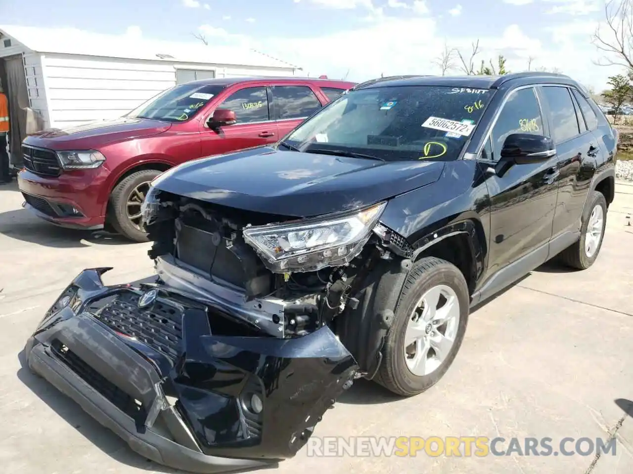 2 Photograph of a damaged car JTMW1RFV3KJ011859 TOYOTA RAV4 2019