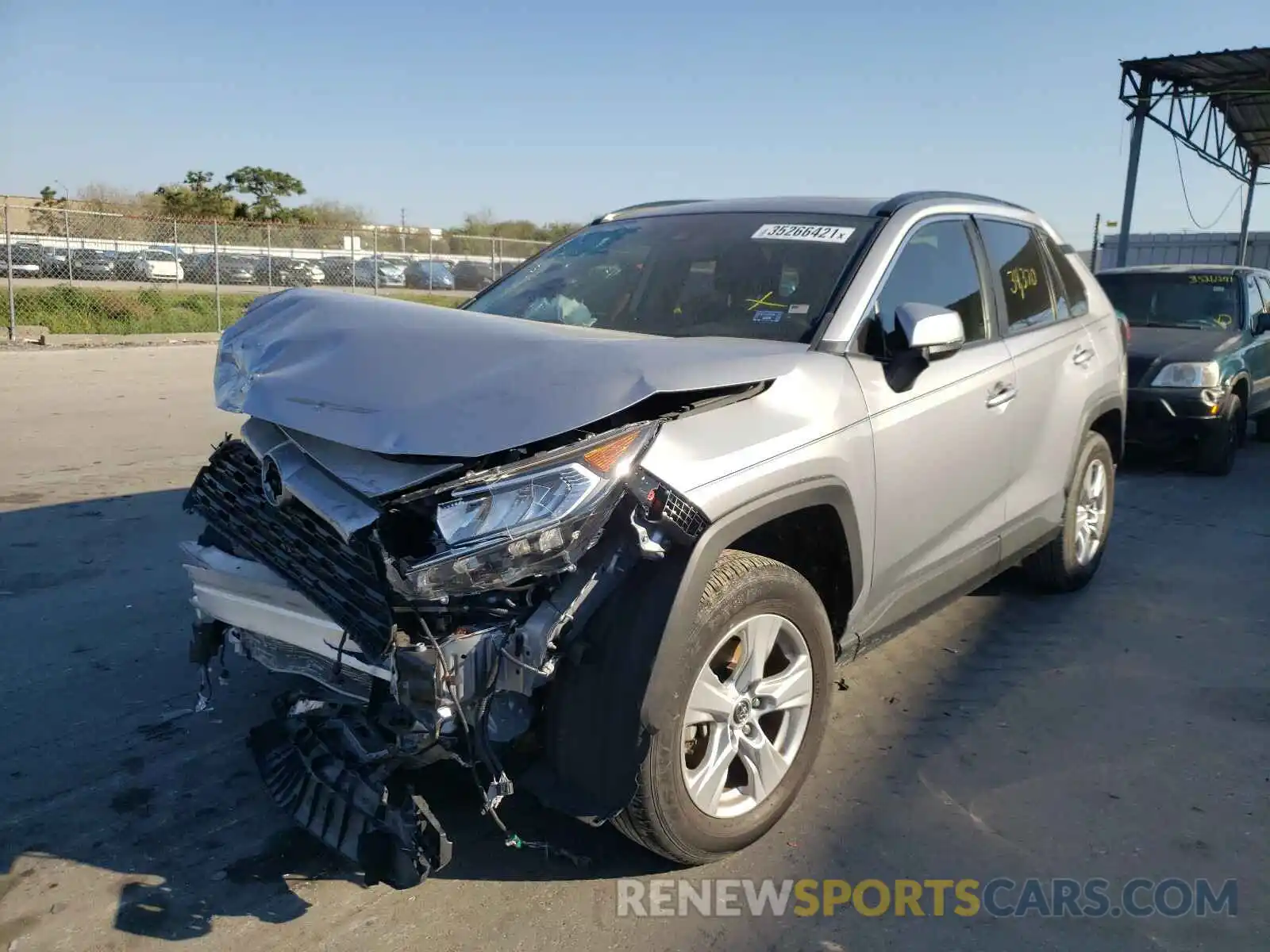 2 Фотография поврежденного автомобиля JTMW1RFV4KD013733 TOYOTA RAV4 2019