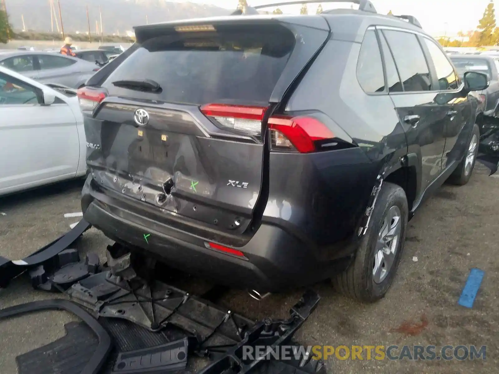 4 Photograph of a damaged car JTMW1RFV5KD009867 TOYOTA RAV4 2019