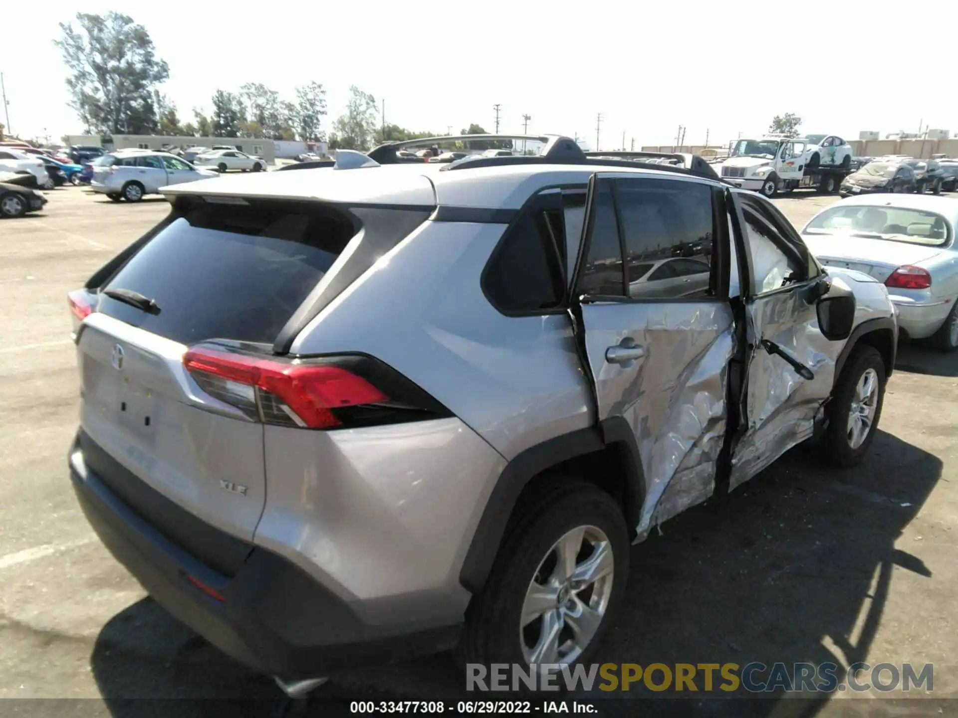 4 Photograph of a damaged car JTMW1RFV7KD014455 TOYOTA RAV4 2019