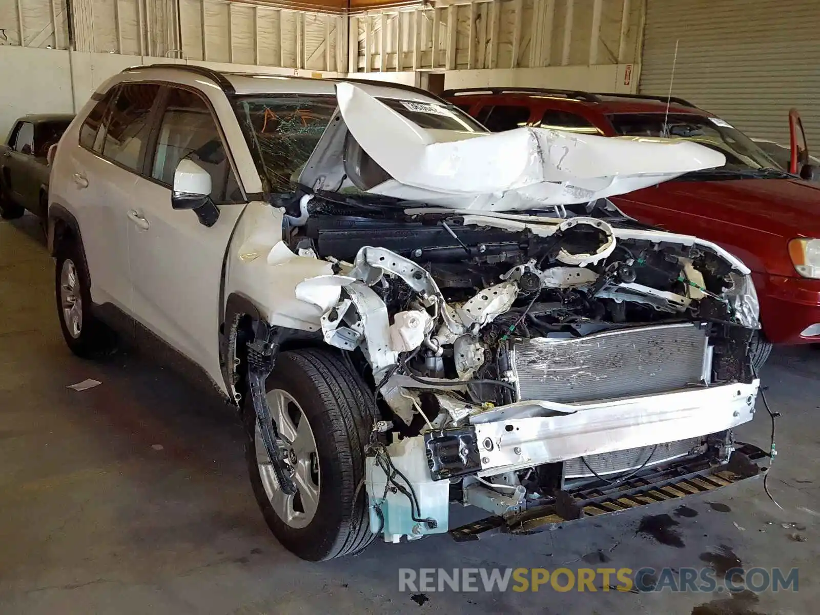 1 Photograph of a damaged car JTMW1RFV7KD033457 TOYOTA RAV4 2019