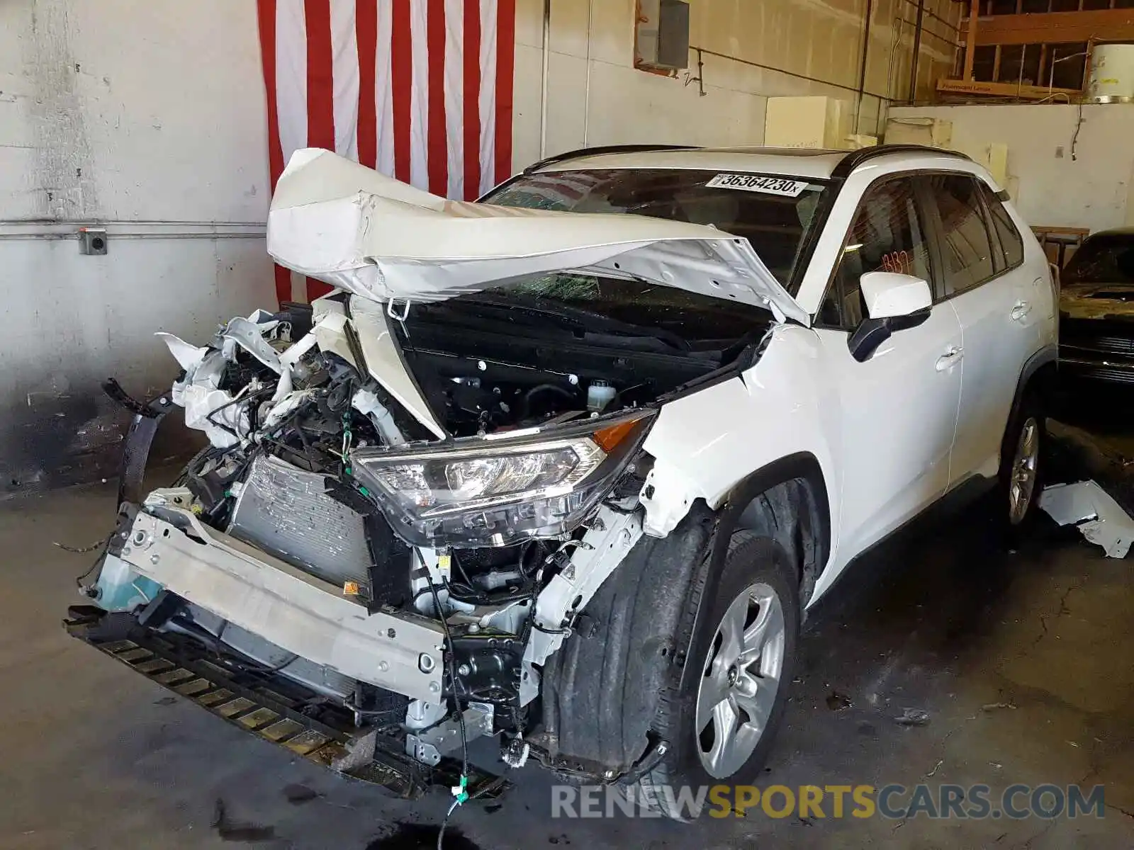 2 Photograph of a damaged car JTMW1RFV7KD033457 TOYOTA RAV4 2019