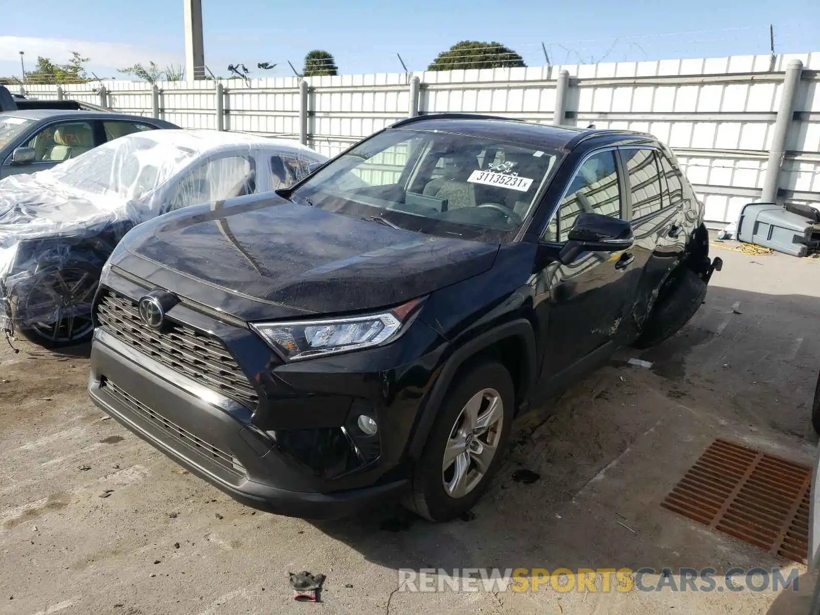 2 Photograph of a damaged car JTMW1RFV7KD502773 TOYOTA RAV4 2019