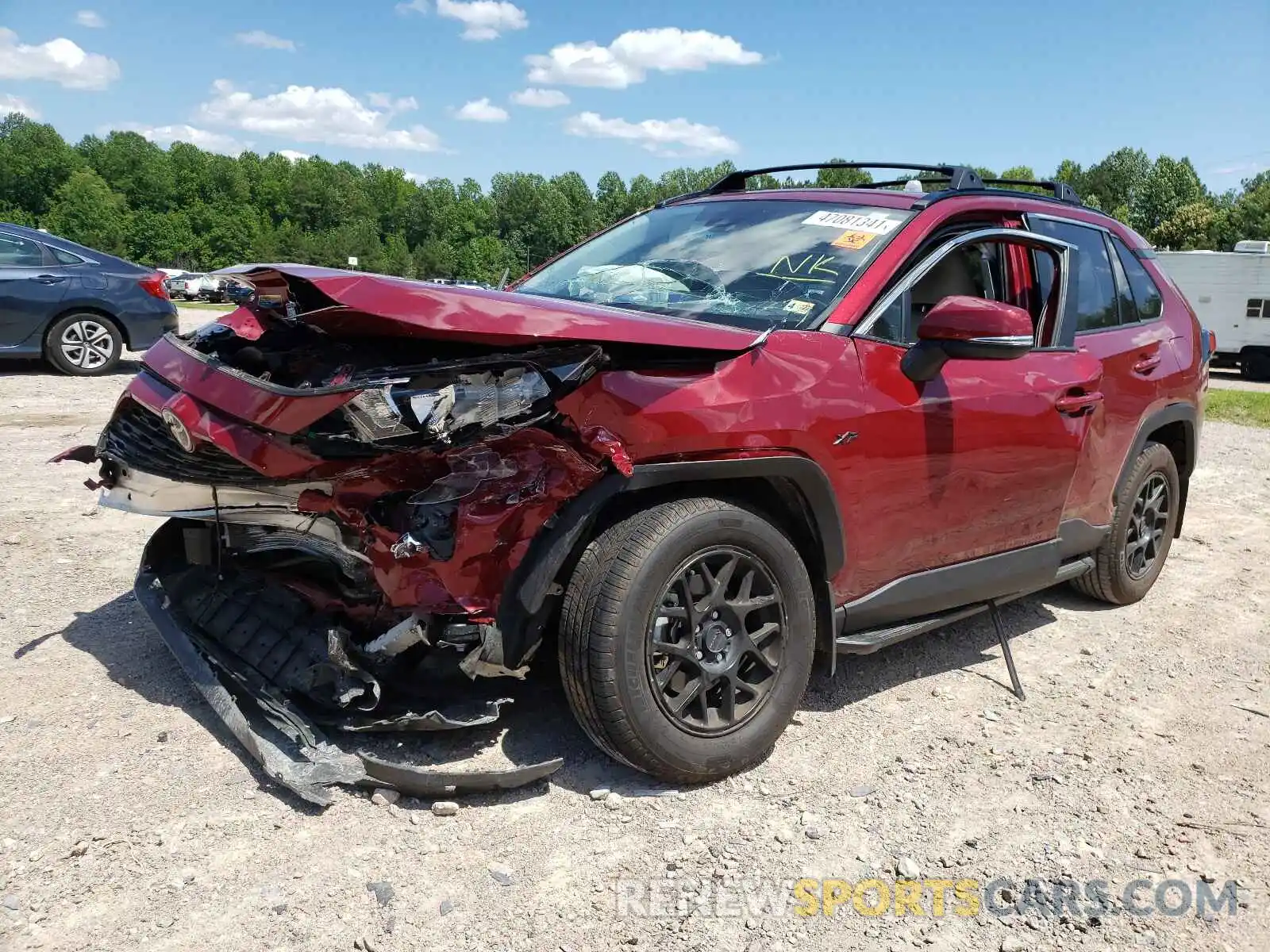 2 Фотография поврежденного автомобиля JTMW1RFV8KD037582 TOYOTA RAV4 2019