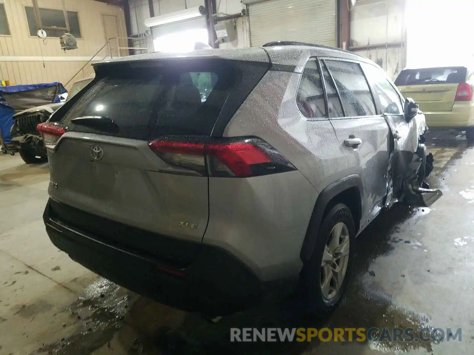 4 Photograph of a damaged car JTMW1RFVXKD013817 TOYOTA RAV4 2019