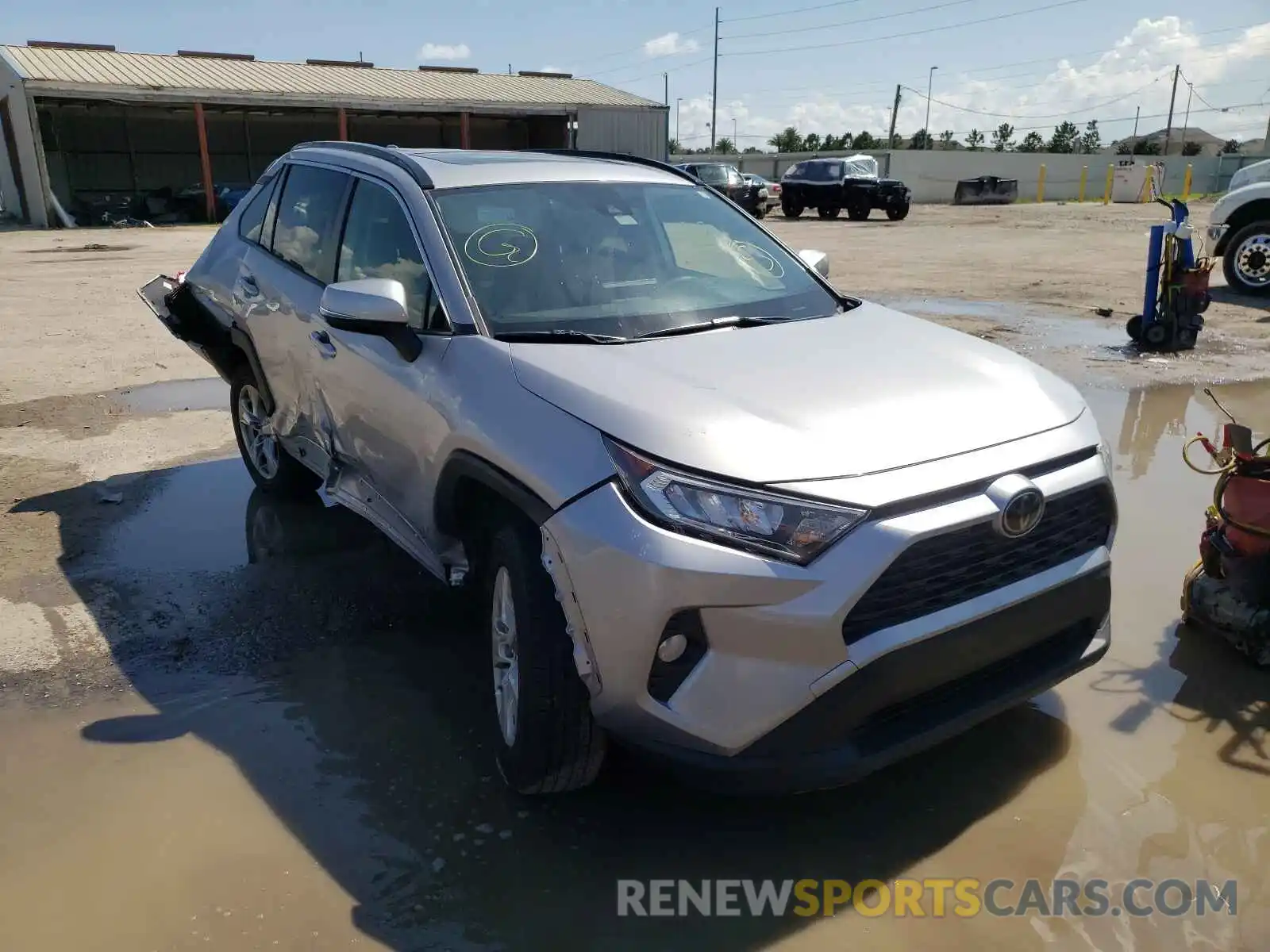 1 Photograph of a damaged car JTMW1RFVXKD511287 TOYOTA RAV4 2019