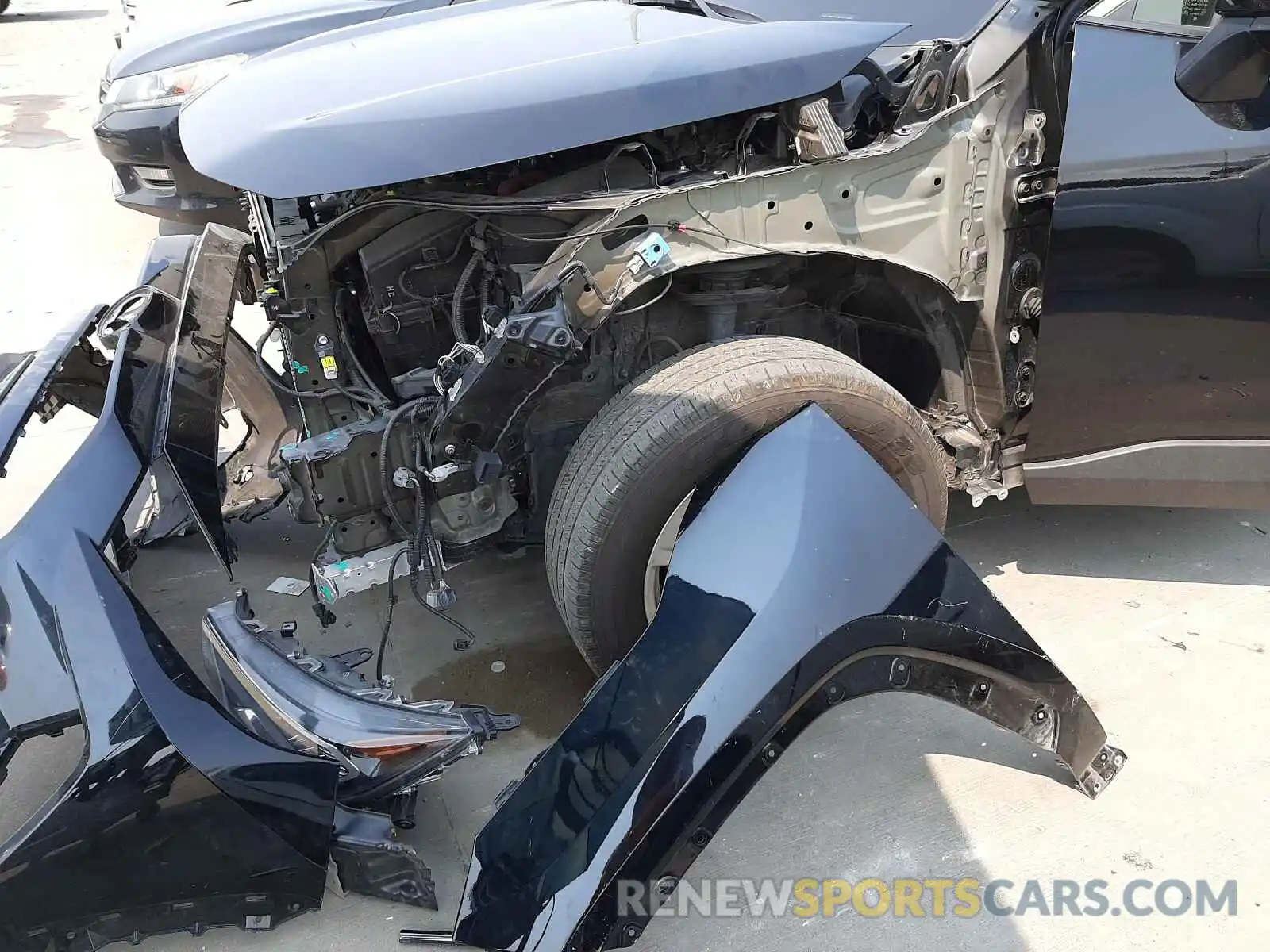 10 Photograph of a damaged car JTMW1RFVXKD512603 TOYOTA RAV4 2019