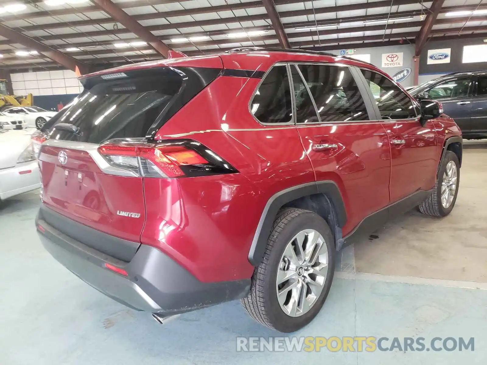 4 Photograph of a damaged car JTMY1RFV2KD506156 TOYOTA RAV4 2019