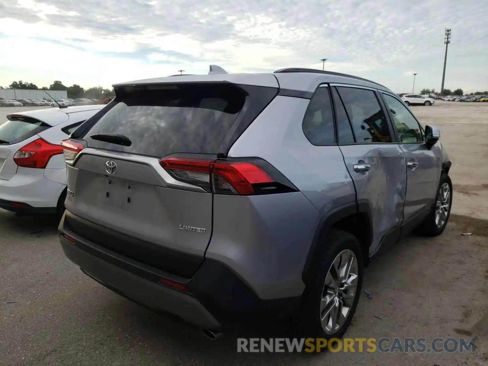 4 Photograph of a damaged car JTMY1RFV7KD006185 TOYOTA RAV4 2019