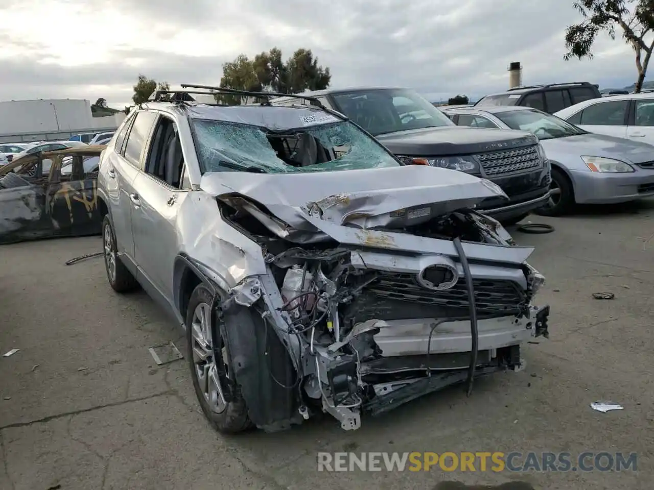 4 Photograph of a damaged car JTMY1RFV8KD035923 TOYOTA RAV4 2019