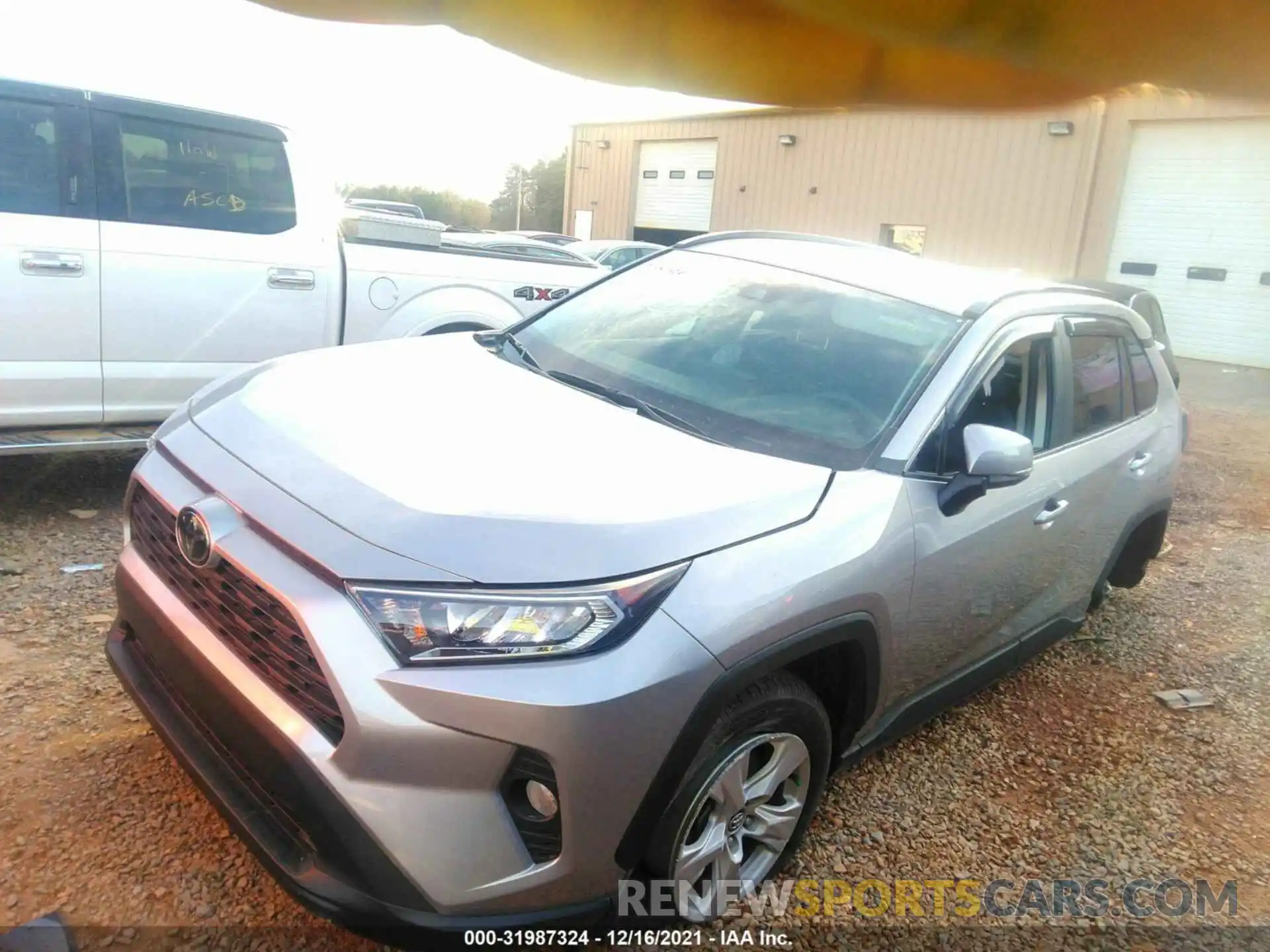 2 Photograph of a damaged car 2T3W1RFV0LC034052 TOYOTA RAV4 2020