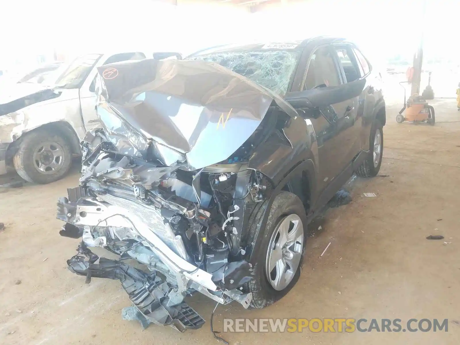 2 Photograph of a damaged car 2T3W1RFV3LC059799 TOYOTA RAV4 2020