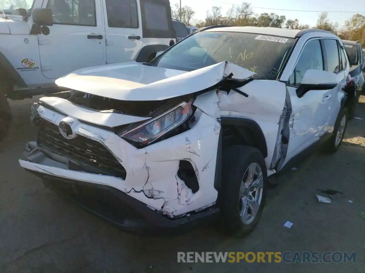 2 Photograph of a damaged car 2T3W1RFV4LC054403 TOYOTA RAV4 2020