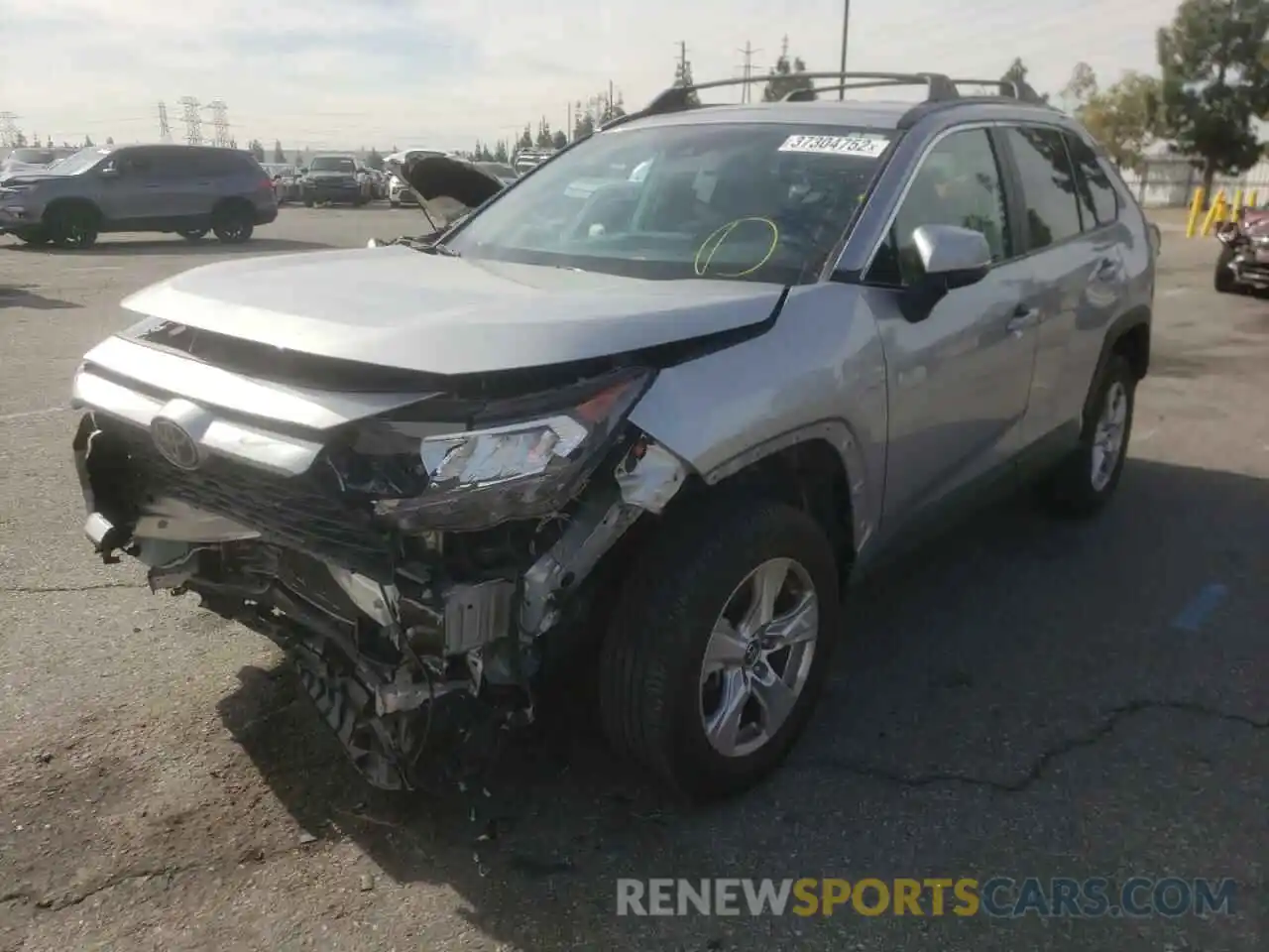 2 Photograph of a damaged car 2T3W1RFVXLC046399 TOYOTA RAV4 2020