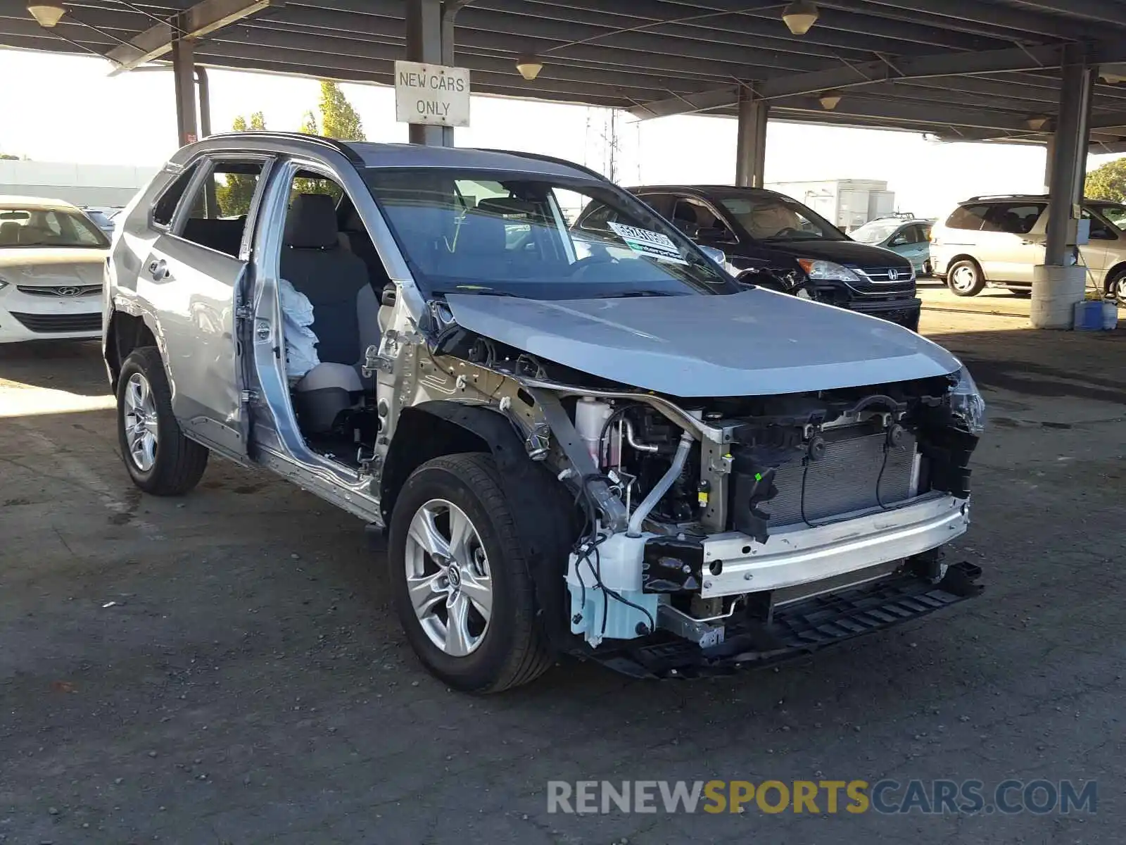 1 Photograph of a damaged car 2T3W1RFVXLW063945 TOYOTA RAV4 2020