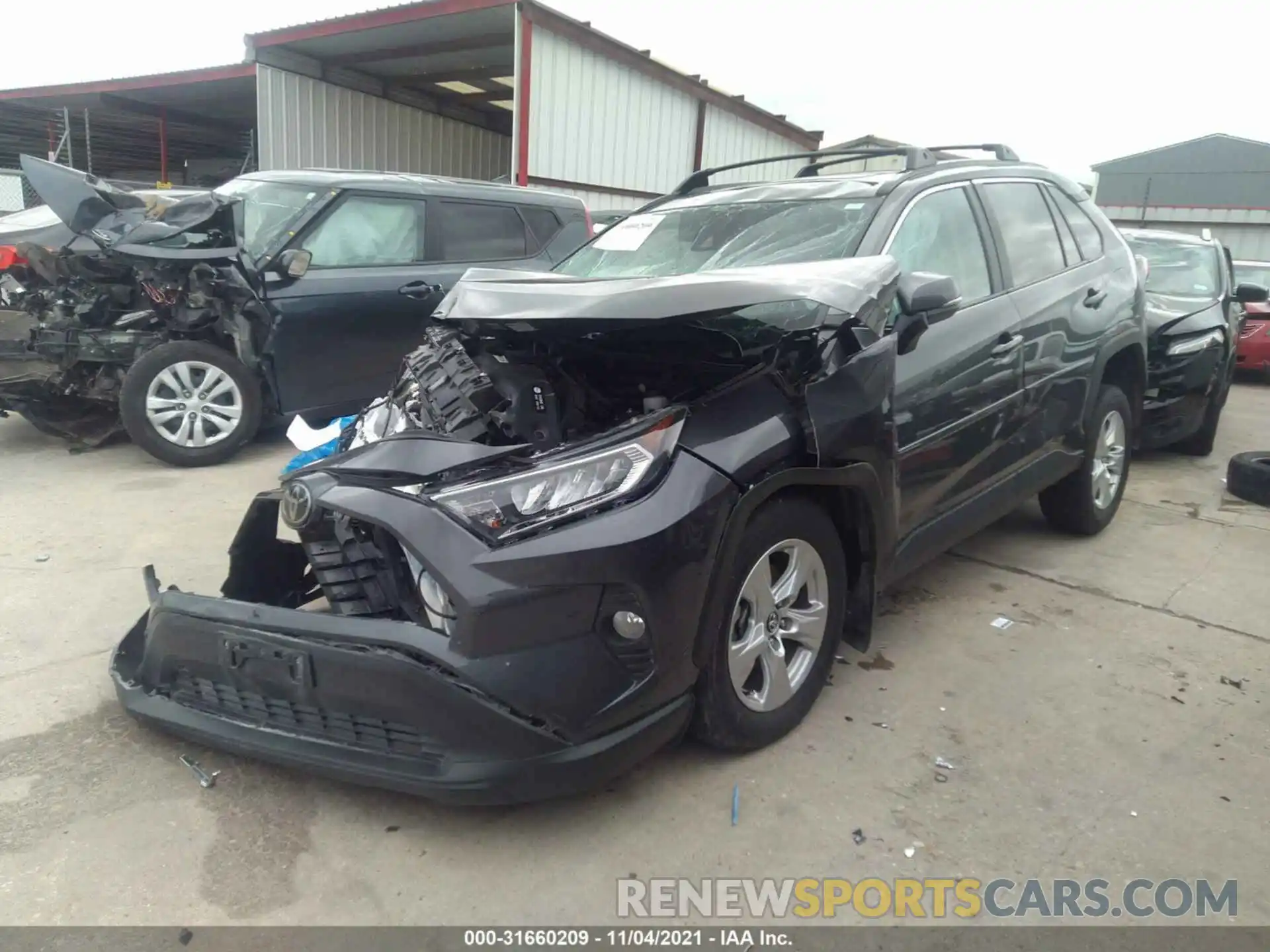 2 Photograph of a damaged car 2T3W1RFVXLW102002 TOYOTA RAV4 2020