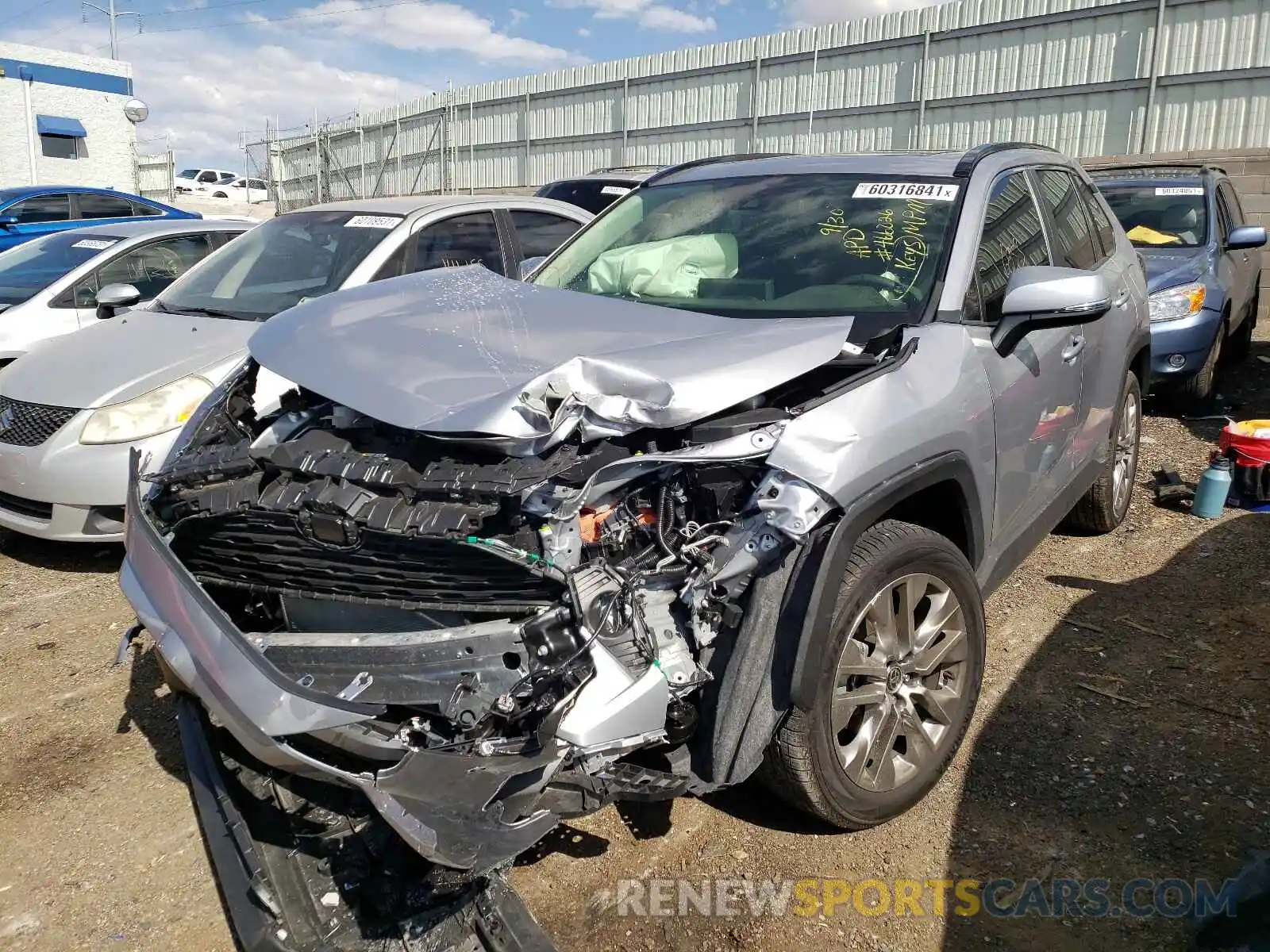 2 Photograph of a damaged car JTMA1RFV0LD059989 TOYOTA RAV4 2020