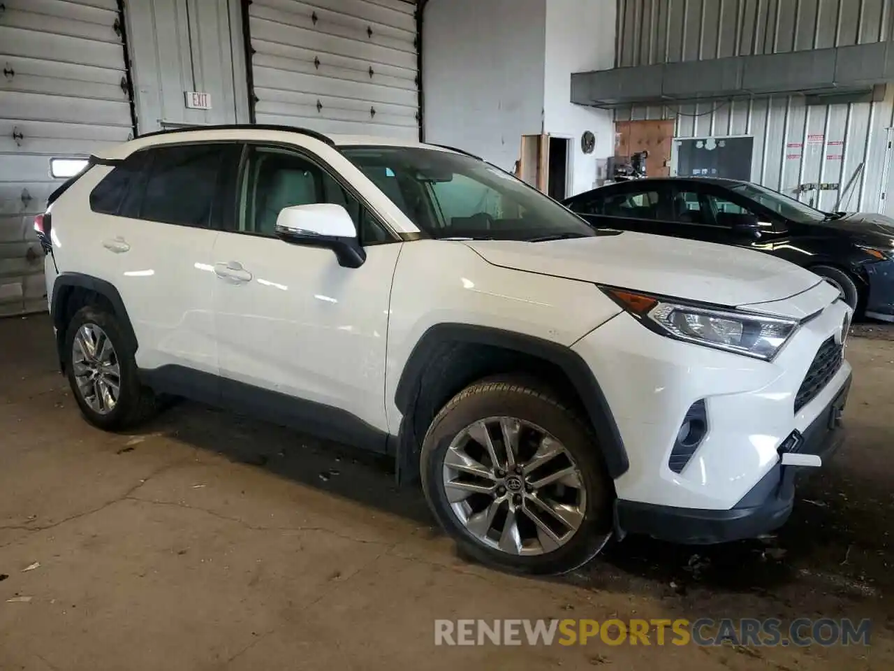 4 Photograph of a damaged car JTMA1RFVXLD058543 TOYOTA RAV4 2020