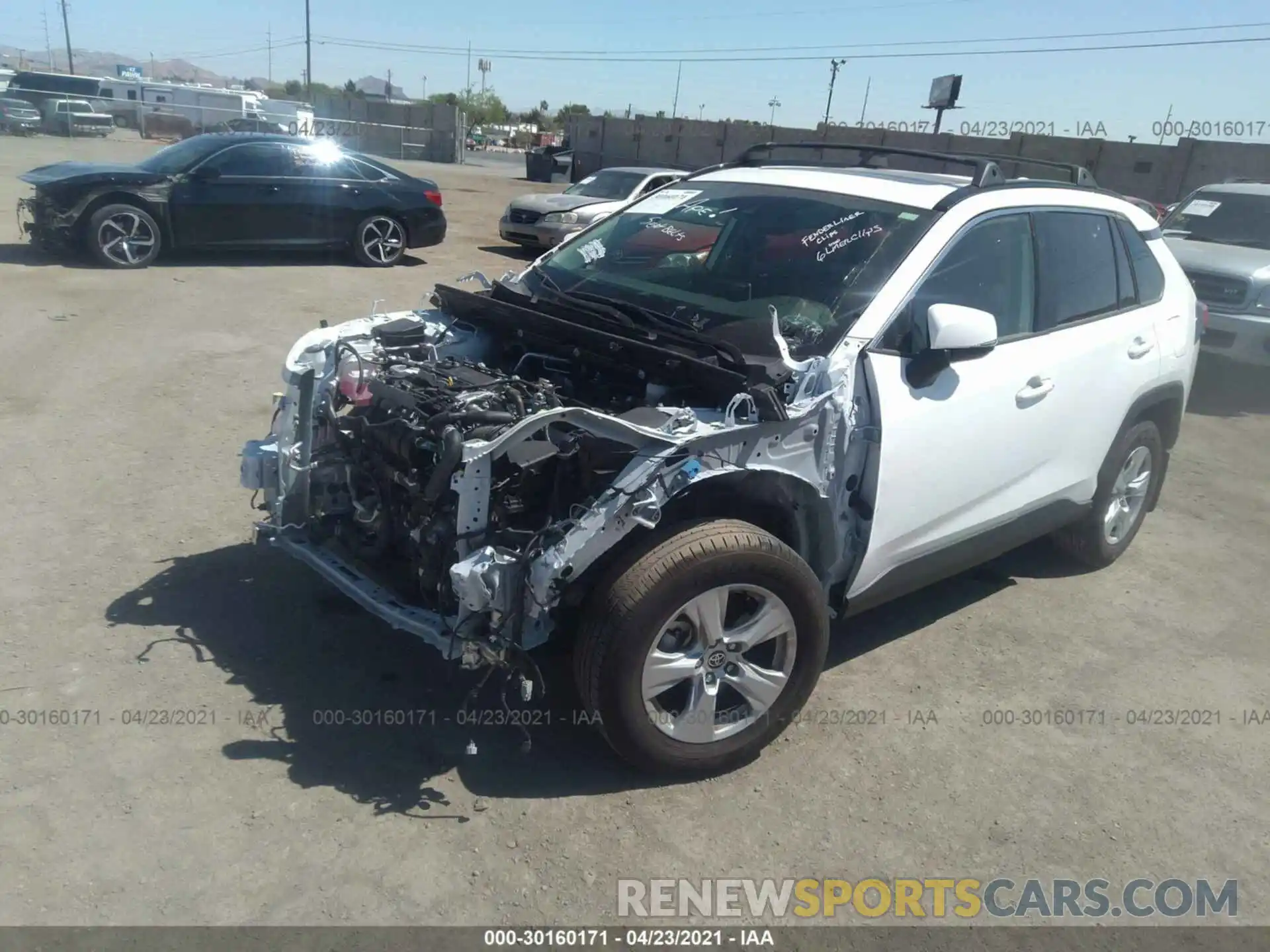 2 Photograph of a damaged car JTMP1RFV7LD058395 TOYOTA RAV4 2020