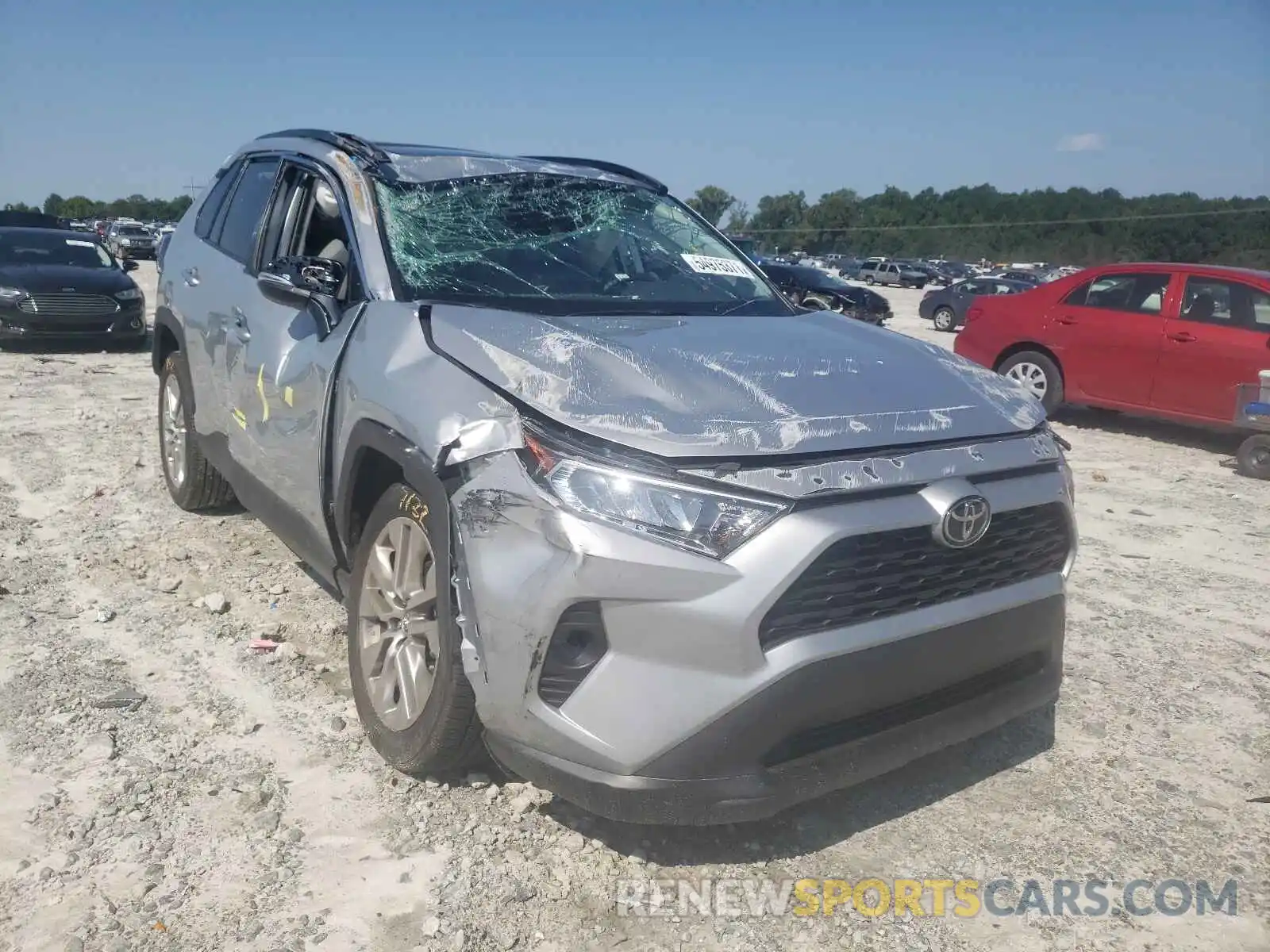 1 Photograph of a damaged car 2T3C1RFV0MW123963 TOYOTA RAV4 2021