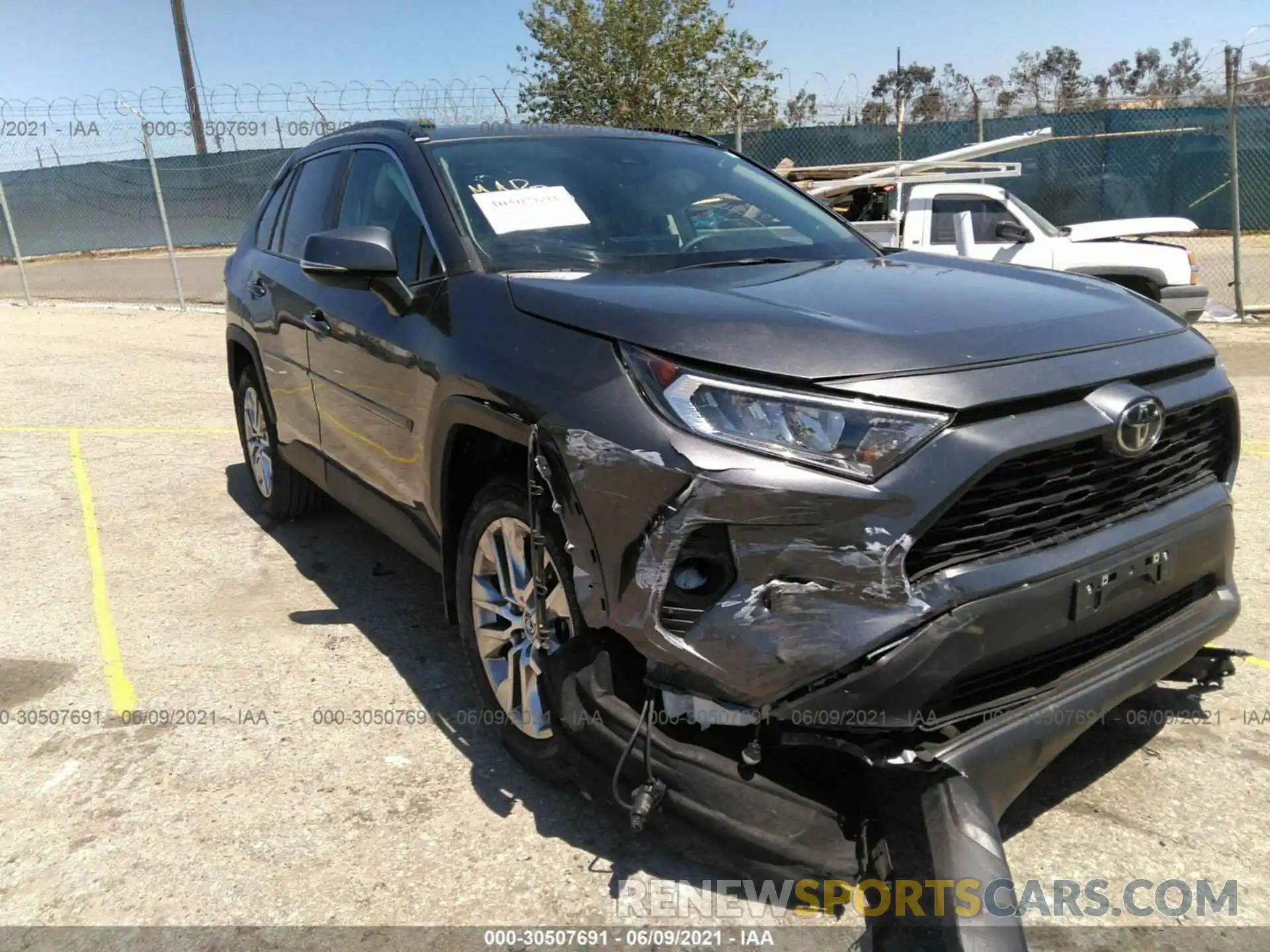 1 Photograph of a damaged car 2T3C1RFVXMC106833 TOYOTA RAV4 2021