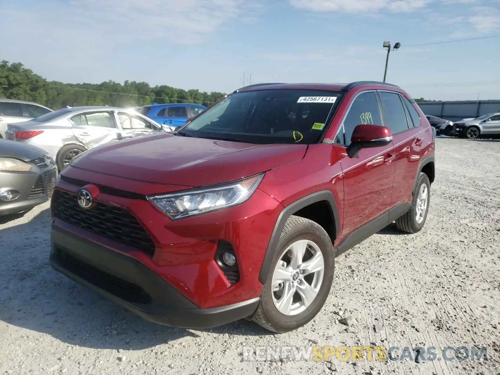 2 Photograph of a damaged car 2T3W1RFV9MW140404 TOYOTA RAV4 2021