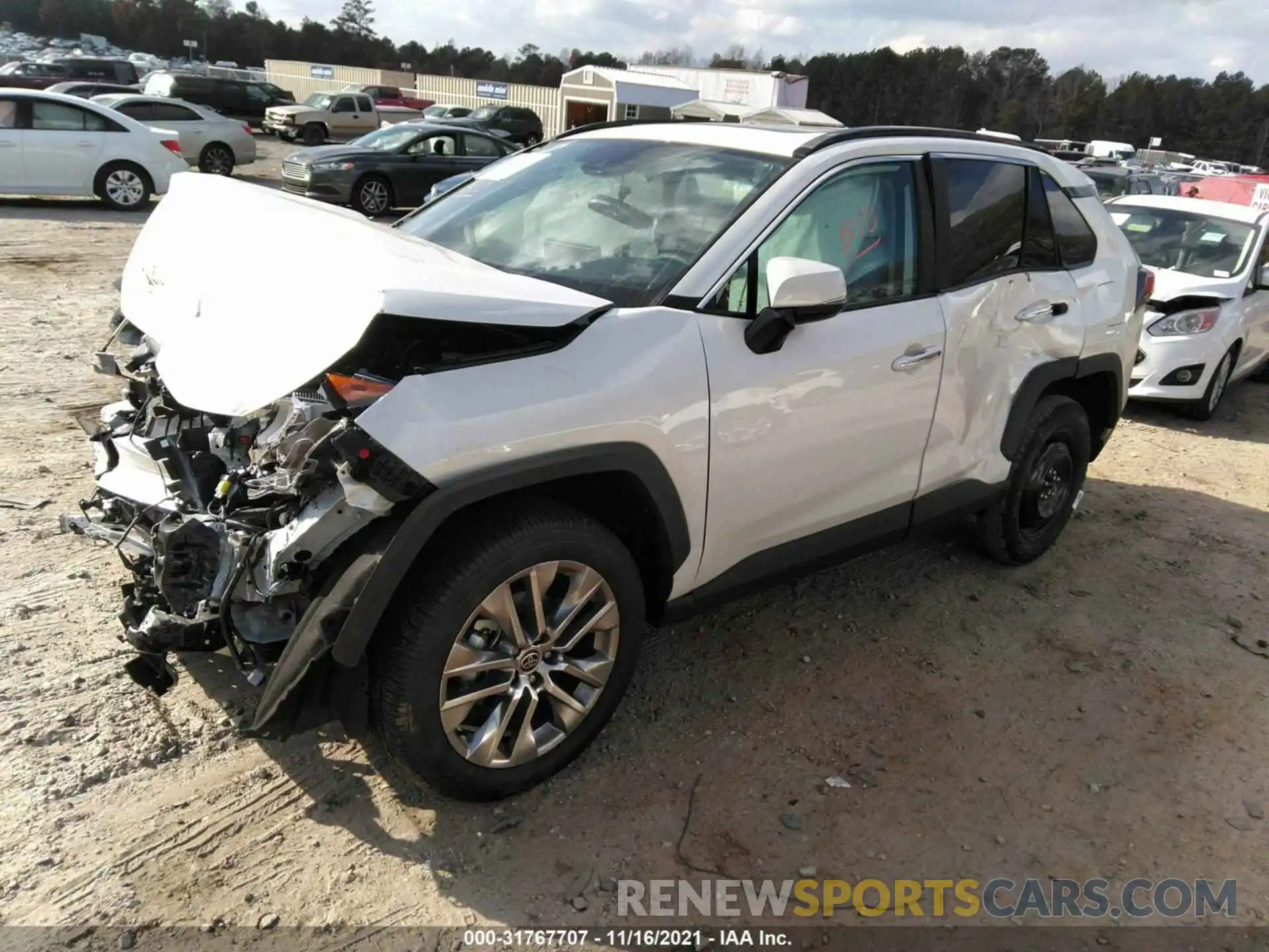 2 Photograph of a damaged car 2T3Y1RFV1MW155634 TOYOTA RAV4 2021