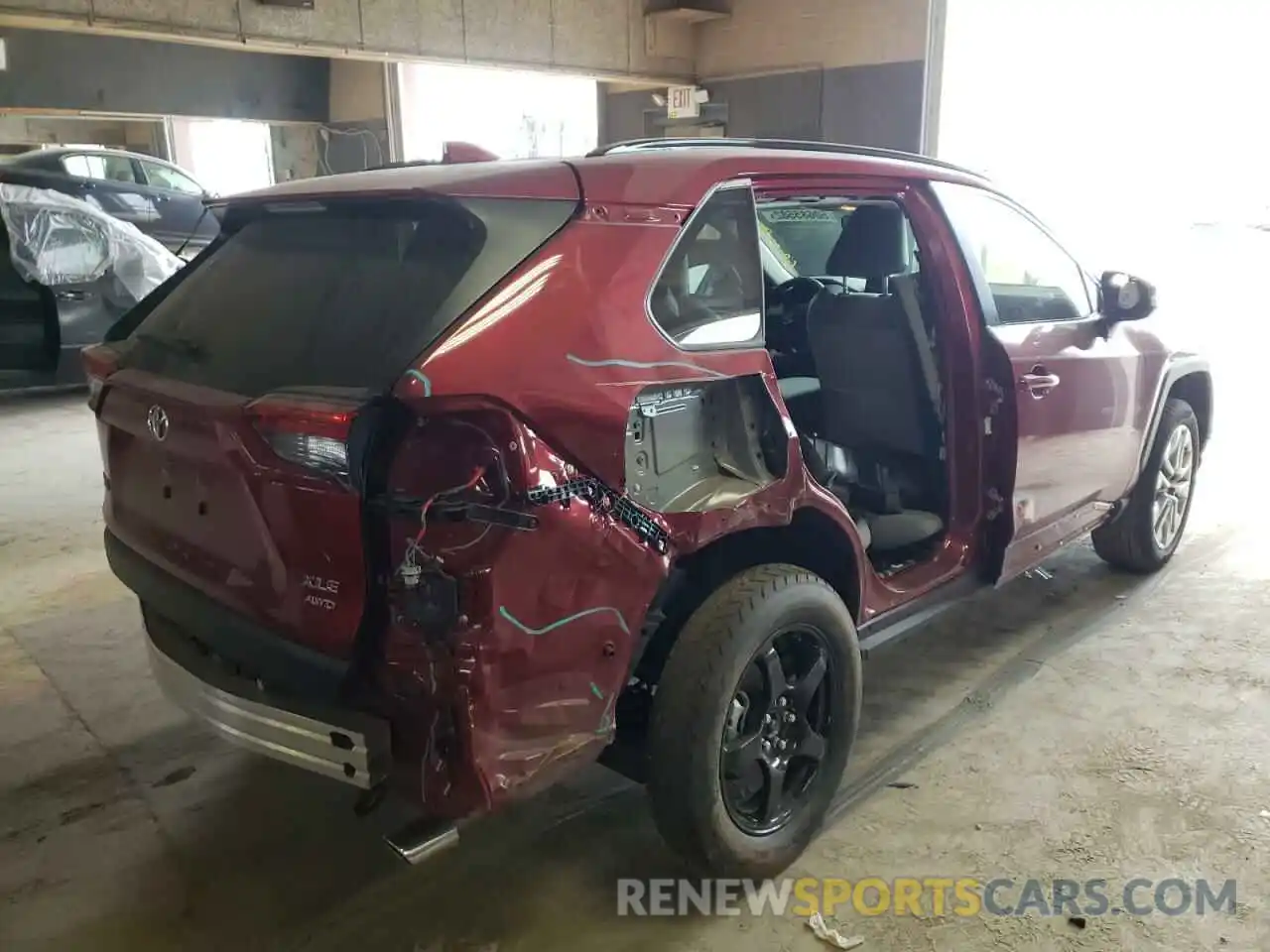 4 Photograph of a damaged car JTMA1RFV2MD070381 TOYOTA RAV4 2021