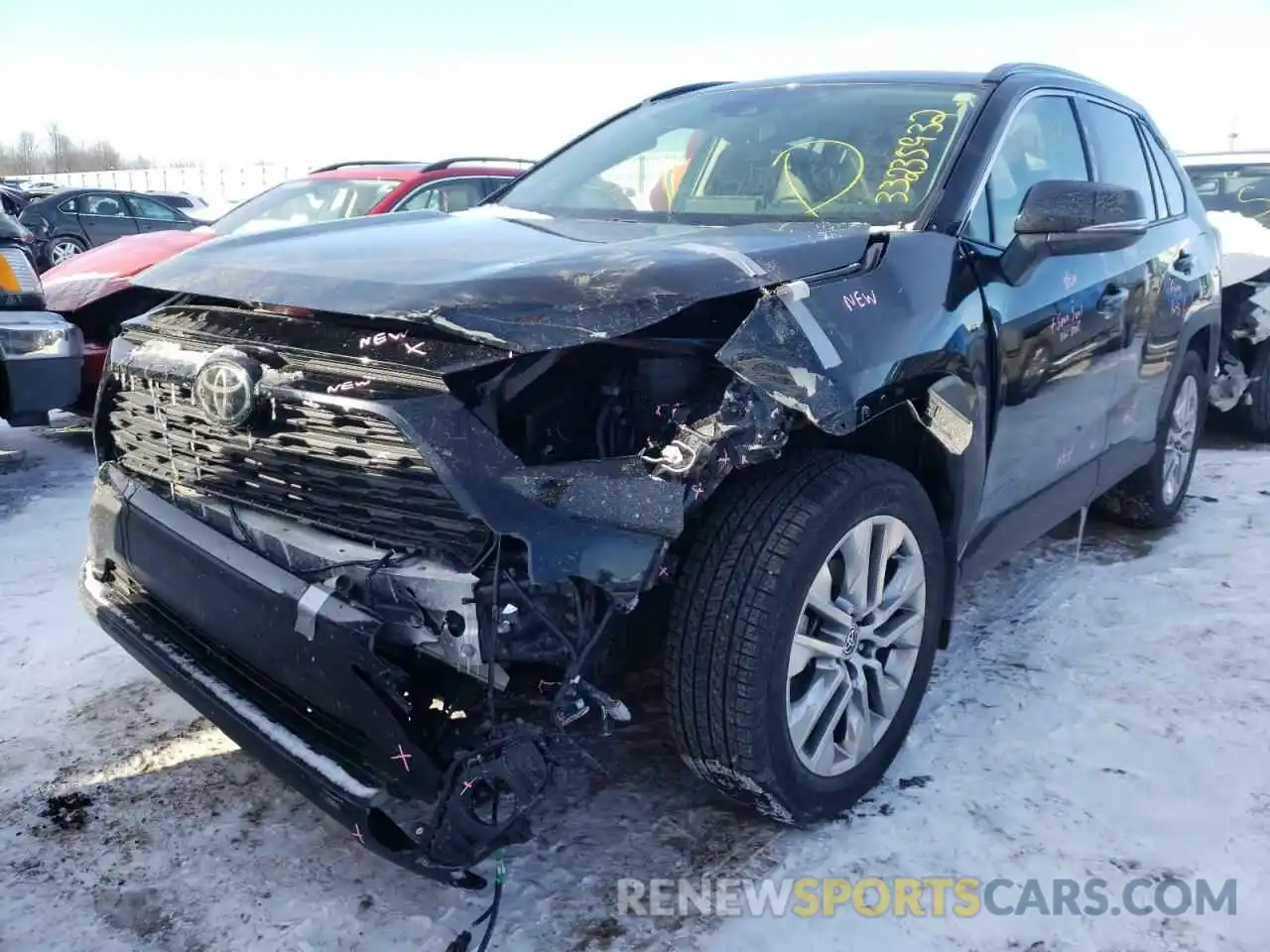 2 Photograph of a damaged car JTMA1RFVXMD076851 TOYOTA RAV4 2021