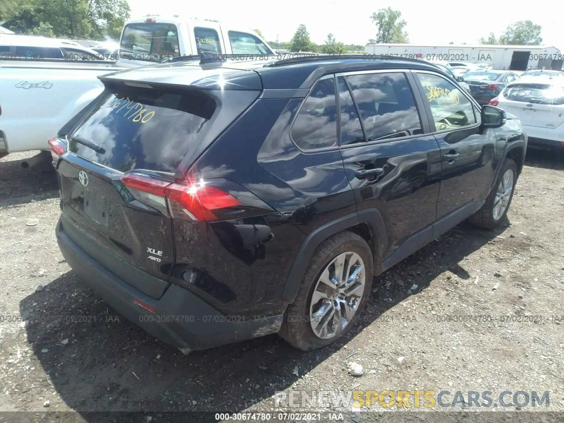 4 Photograph of a damaged car JTMA1RFVXMJ039767 TOYOTA RAV4 2021