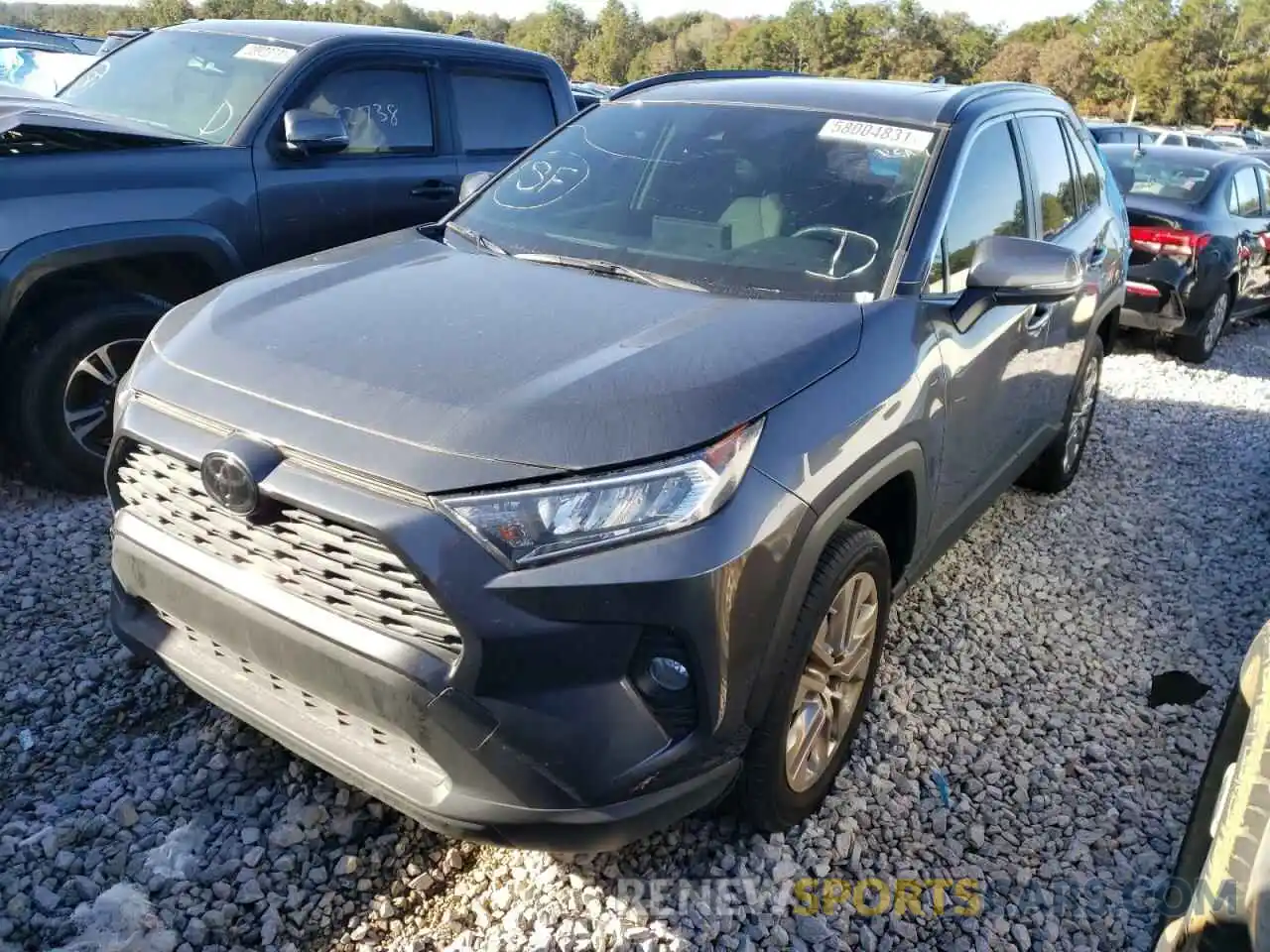 2 Photograph of a damaged car JTMC1RFVXMD065132 TOYOTA RAV4 2021