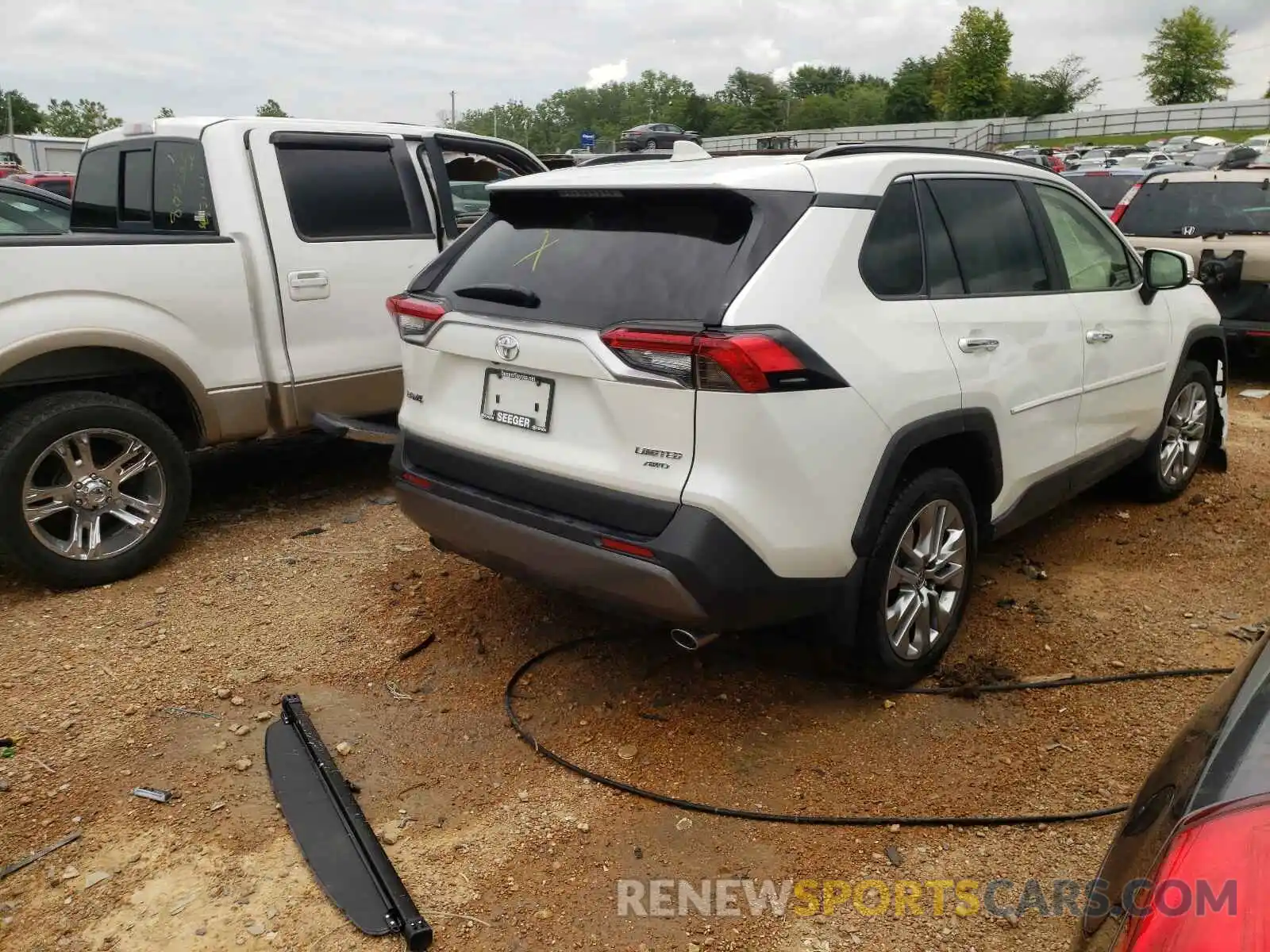 4 Photograph of a damaged car JTMN1RFV4MD532392 TOYOTA RAV4 2021