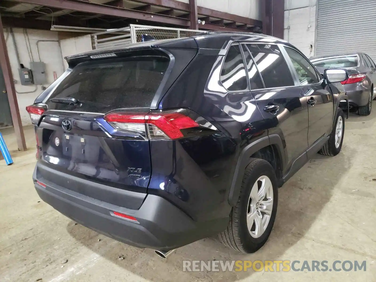 4 Photograph of a damaged car JTMP1RFV8MD069360 TOYOTA RAV4 2021