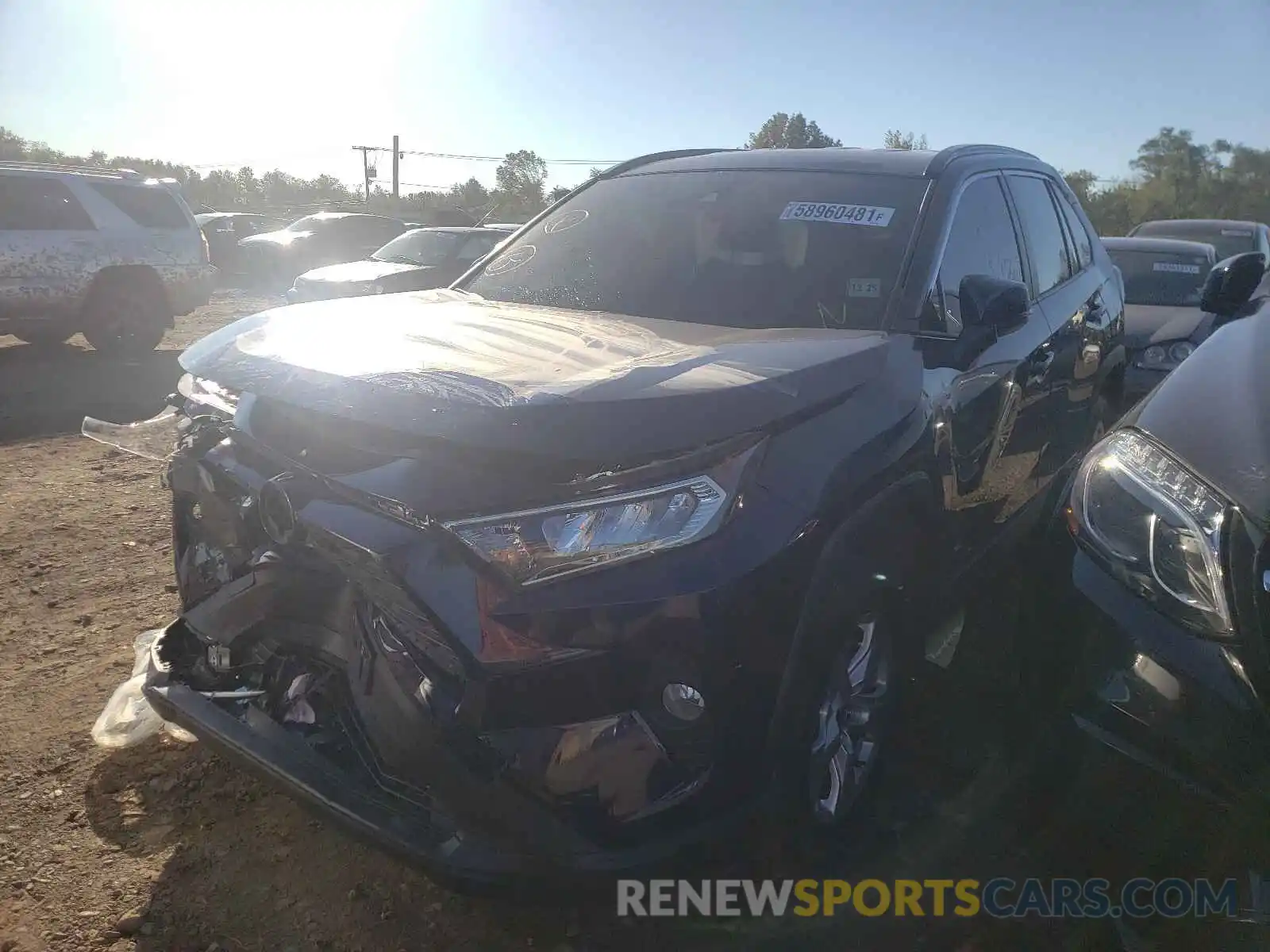 2 Photograph of a damaged car JTMP1RFVXMD073099 TOYOTA RAV4 2021