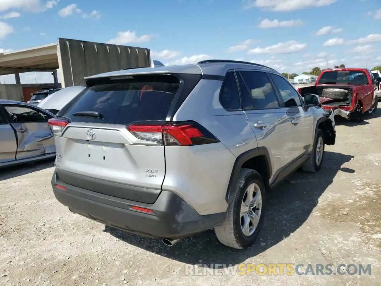 4 Photograph of a damaged car JTMP1RFVXMD079680 TOYOTA RAV4 2021