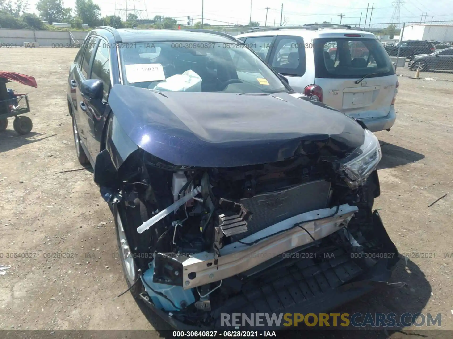 6 Photograph of a damaged car JTMW1RFV3MD064630 TOYOTA RAV4 2021