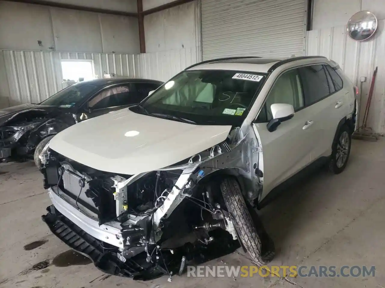 2 Photograph of a damaged car JTMA1RFV8ND085386 TOYOTA RAV4 2022