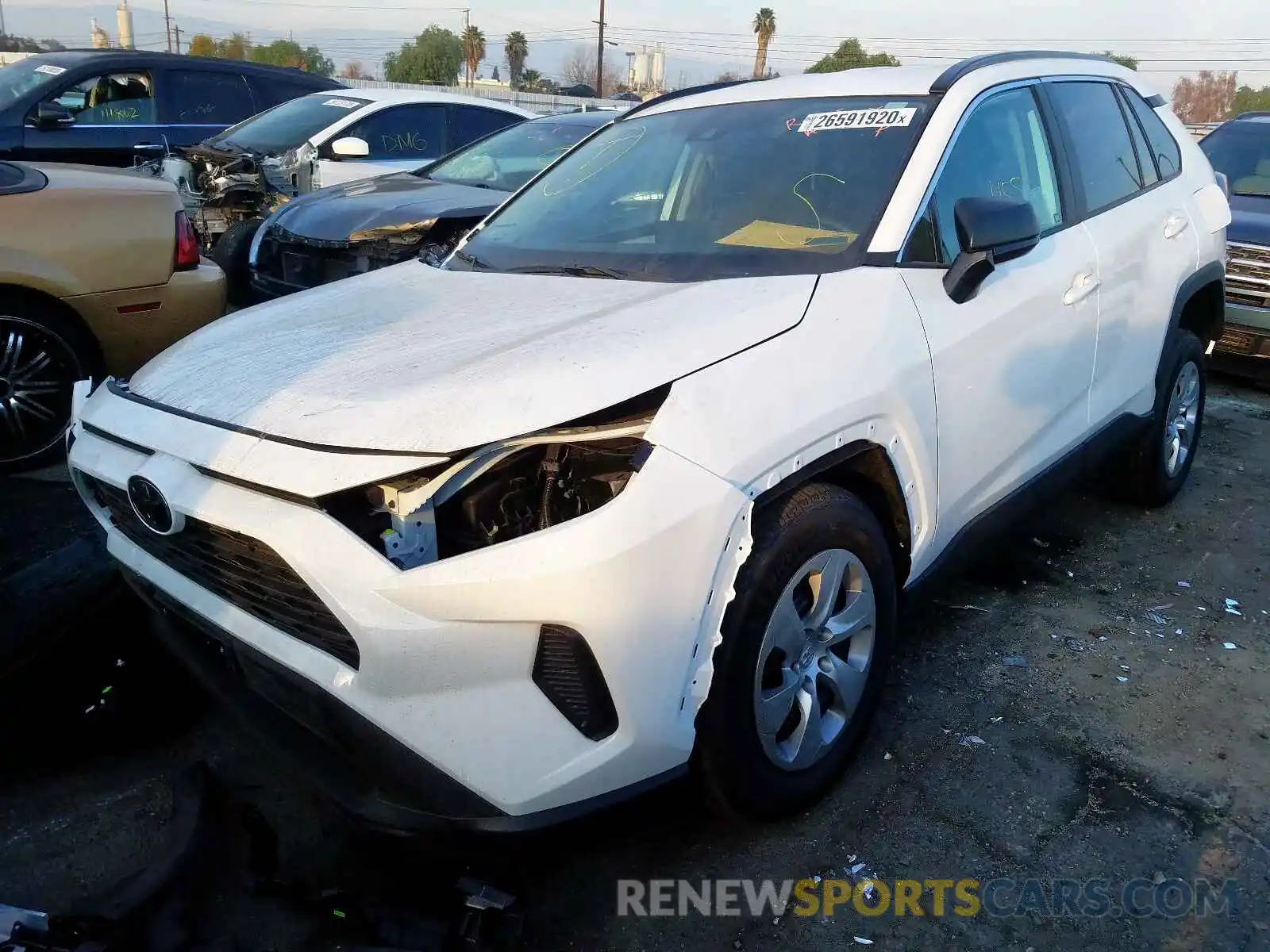 2 Photograph of a damaged car 2T3H1RFV2KC019057 TOYOTA RAV4 LE 2019