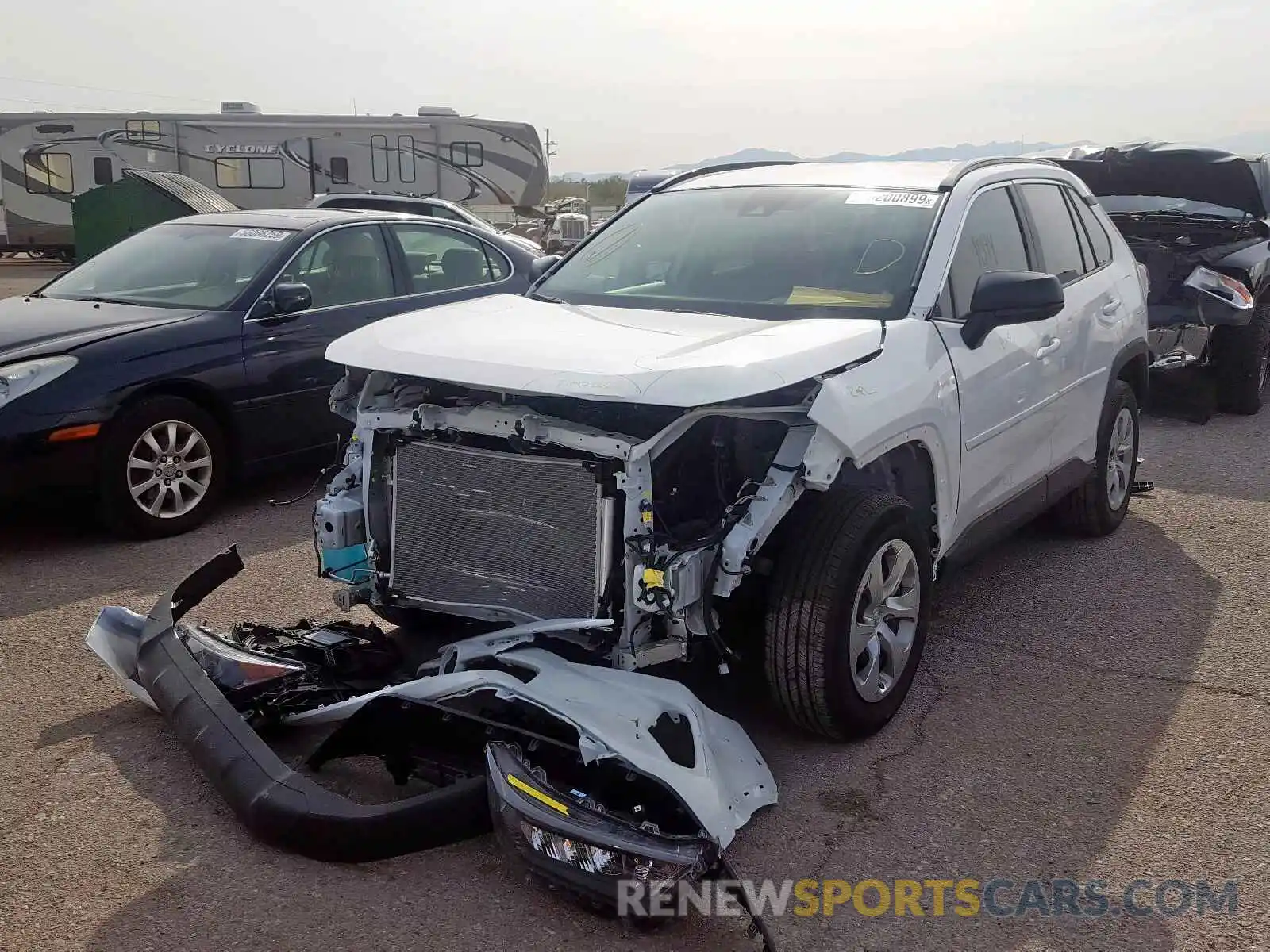 2 Photograph of a damaged car 2T3H1RFV3KC020587 TOYOTA RAV4 LE 2019