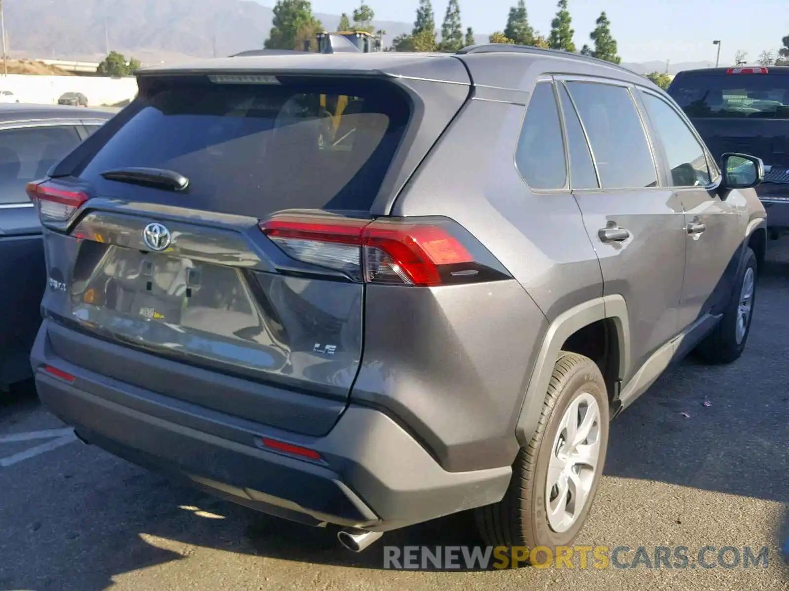 4 Photograph of a damaged car 2T3H1RFV4KW015235 TOYOTA RAV4 LE 2019