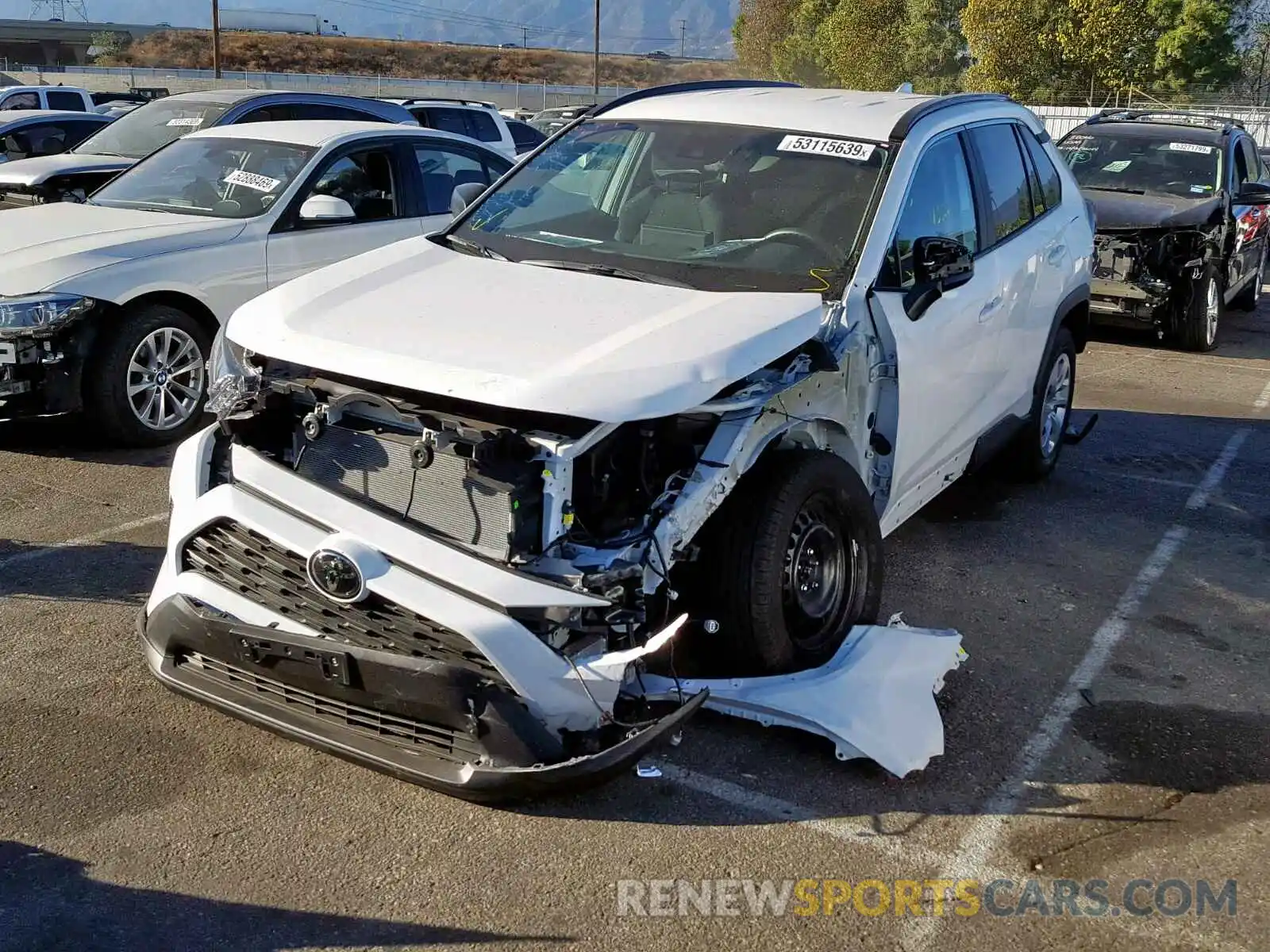 2 Photograph of a damaged car 2T3H1RFV6KC013066 TOYOTA RAV4 LE 2019