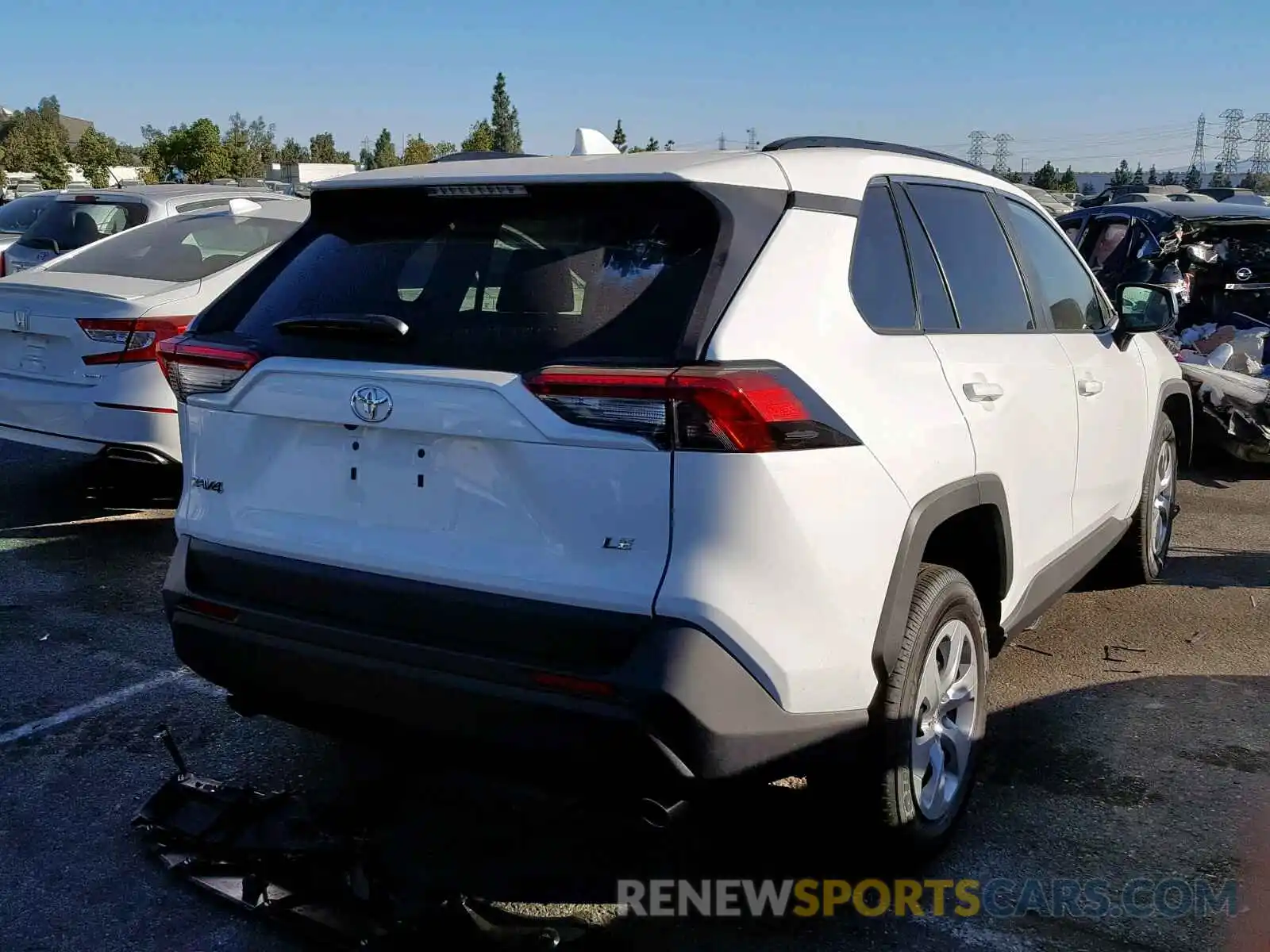 4 Photograph of a damaged car 2T3H1RFV6KC013066 TOYOTA RAV4 LE 2019