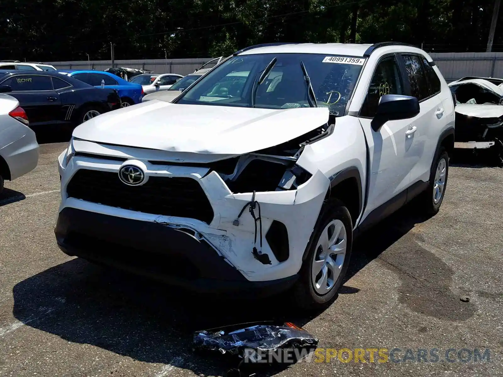 2 Photograph of a damaged car 2T3H1RFVXKW032959 TOYOTA RAV4 LE 2019