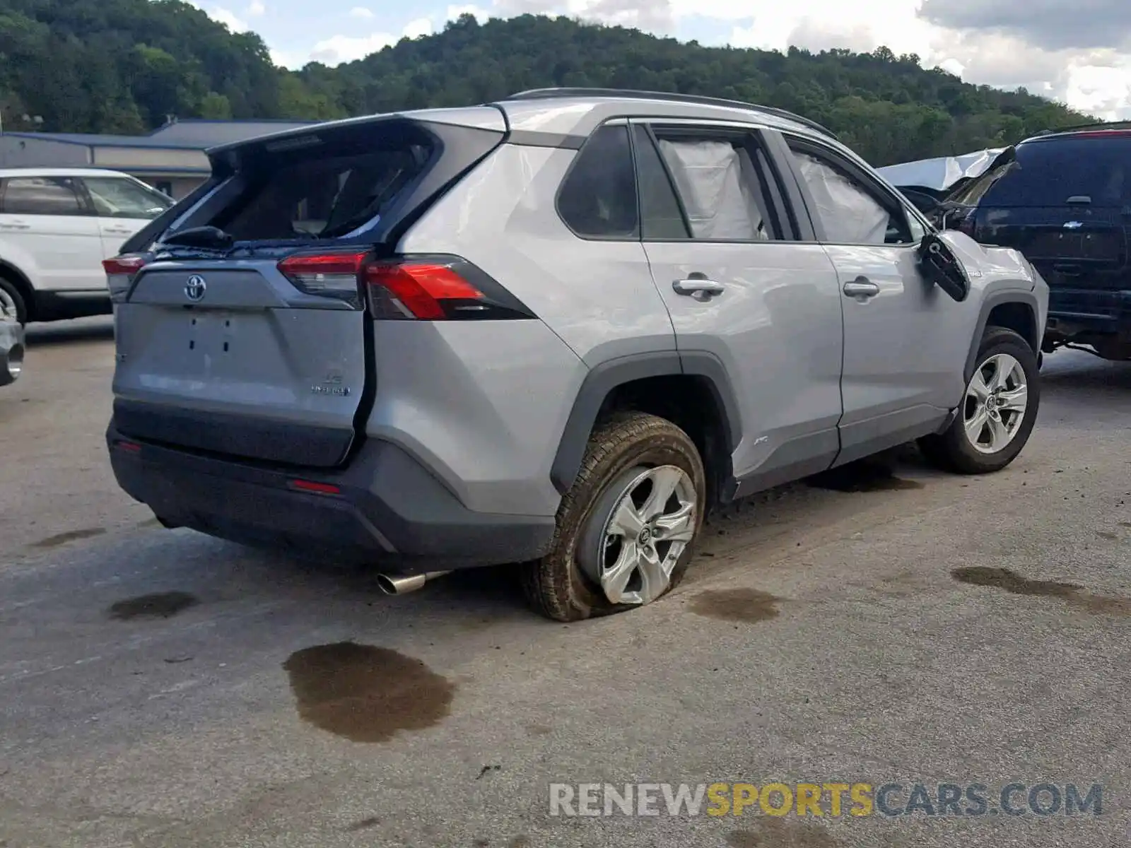 4 Photograph of a damaged car 2T3MWRFV2KW002855 TOYOTA RAV4 LE 2019