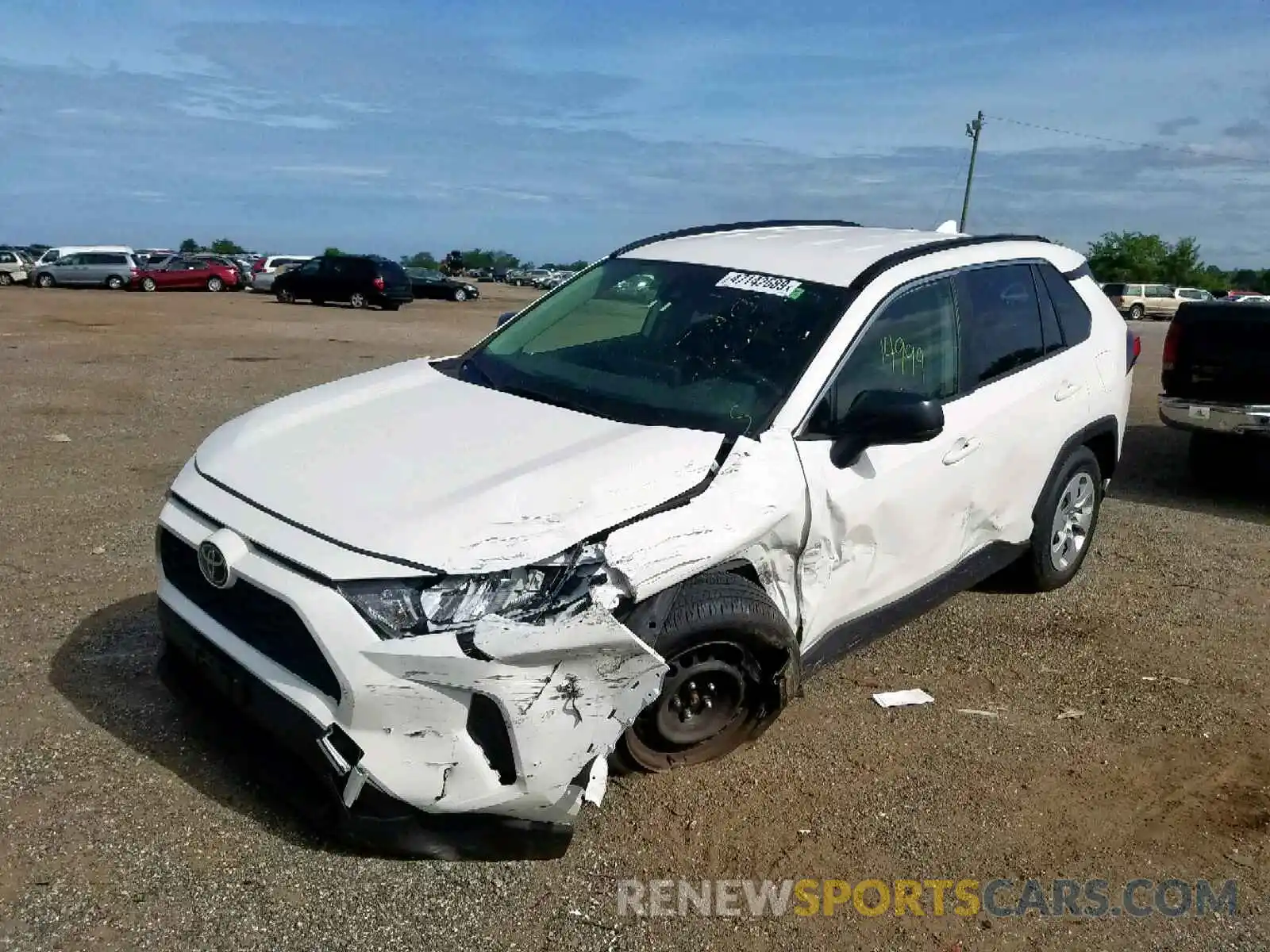 2 Photograph of a damaged car JTMF1RFV0KD002695 TOYOTA RAV4 LE 2019