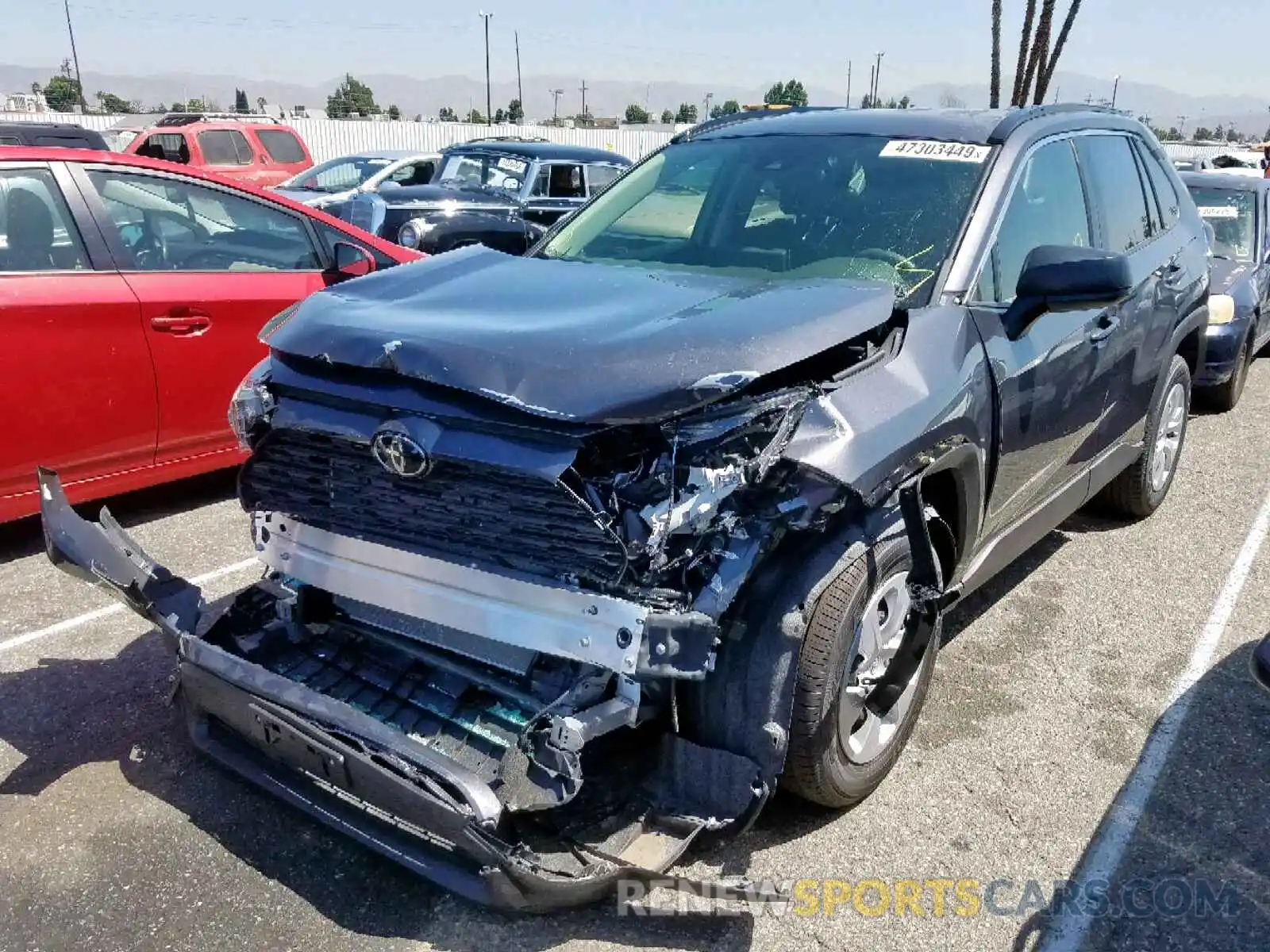 2 Photograph of a damaged car JTMF1RFV5KJ015427 TOYOTA RAV4 LE 2019