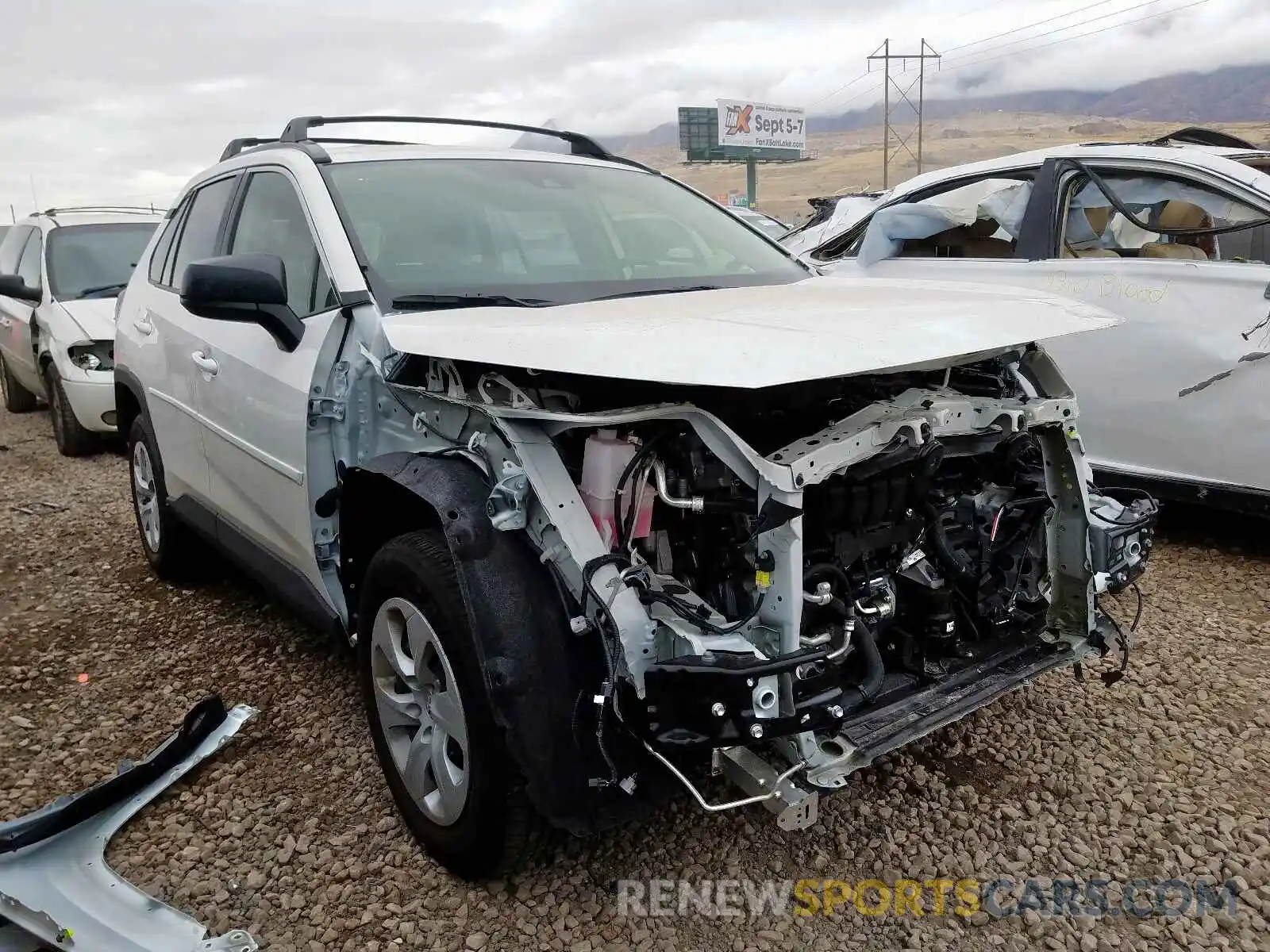 1 Photograph of a damaged car JTMF1RFV7KD005819 TOYOTA RAV4 LE 2019