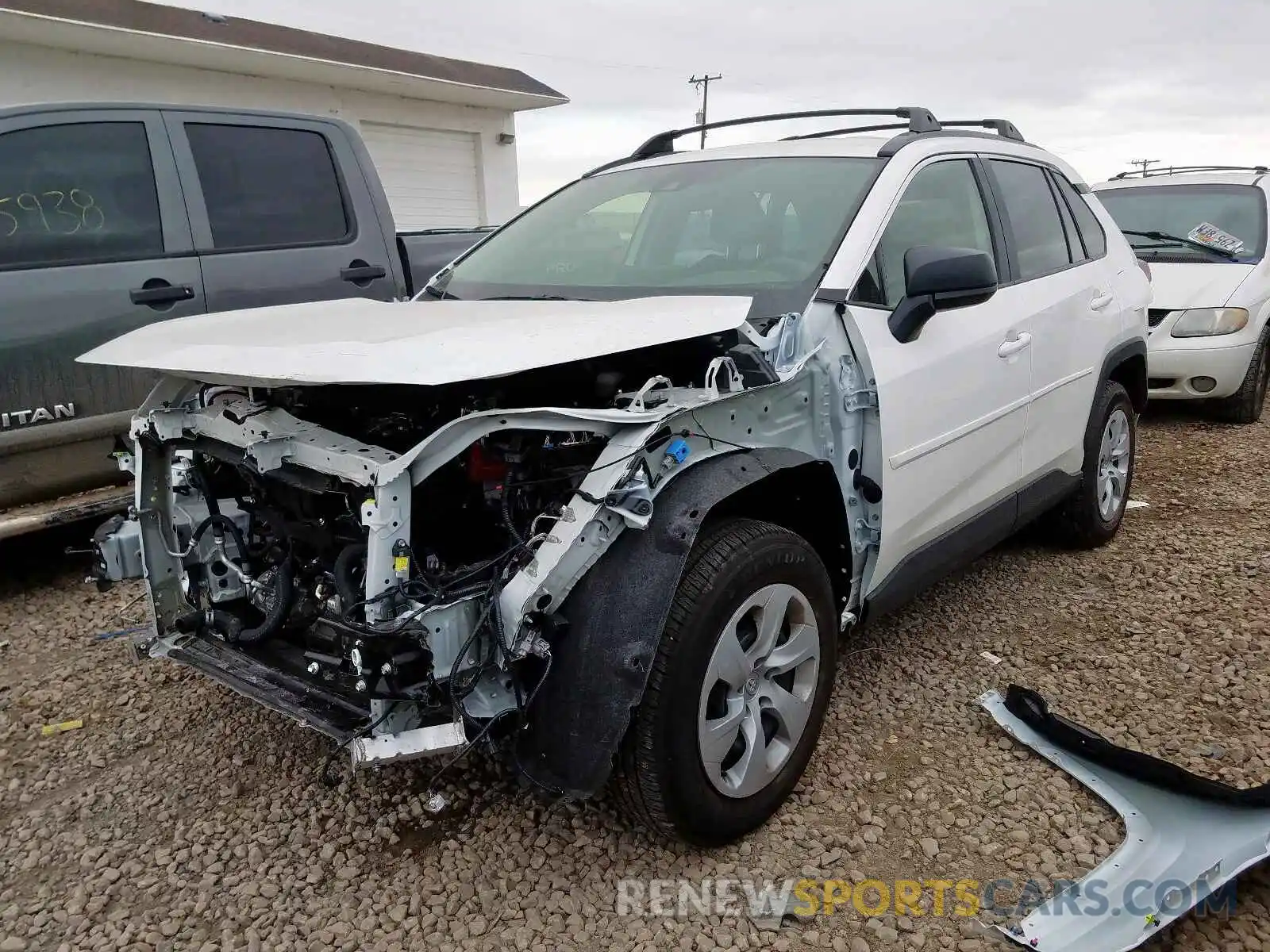 2 Photograph of a damaged car JTMF1RFV7KD005819 TOYOTA RAV4 LE 2019