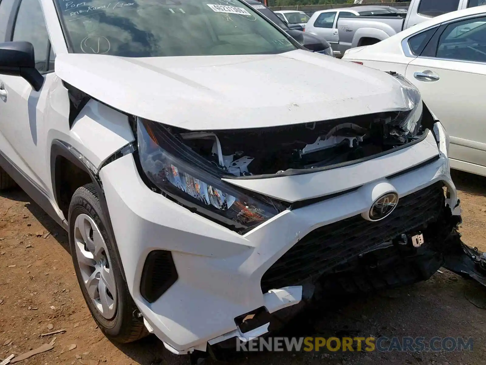 9 Фотография поврежденного автомобиля JTMF1RFV7KD500716 TOYOTA RAV4 LE 2019