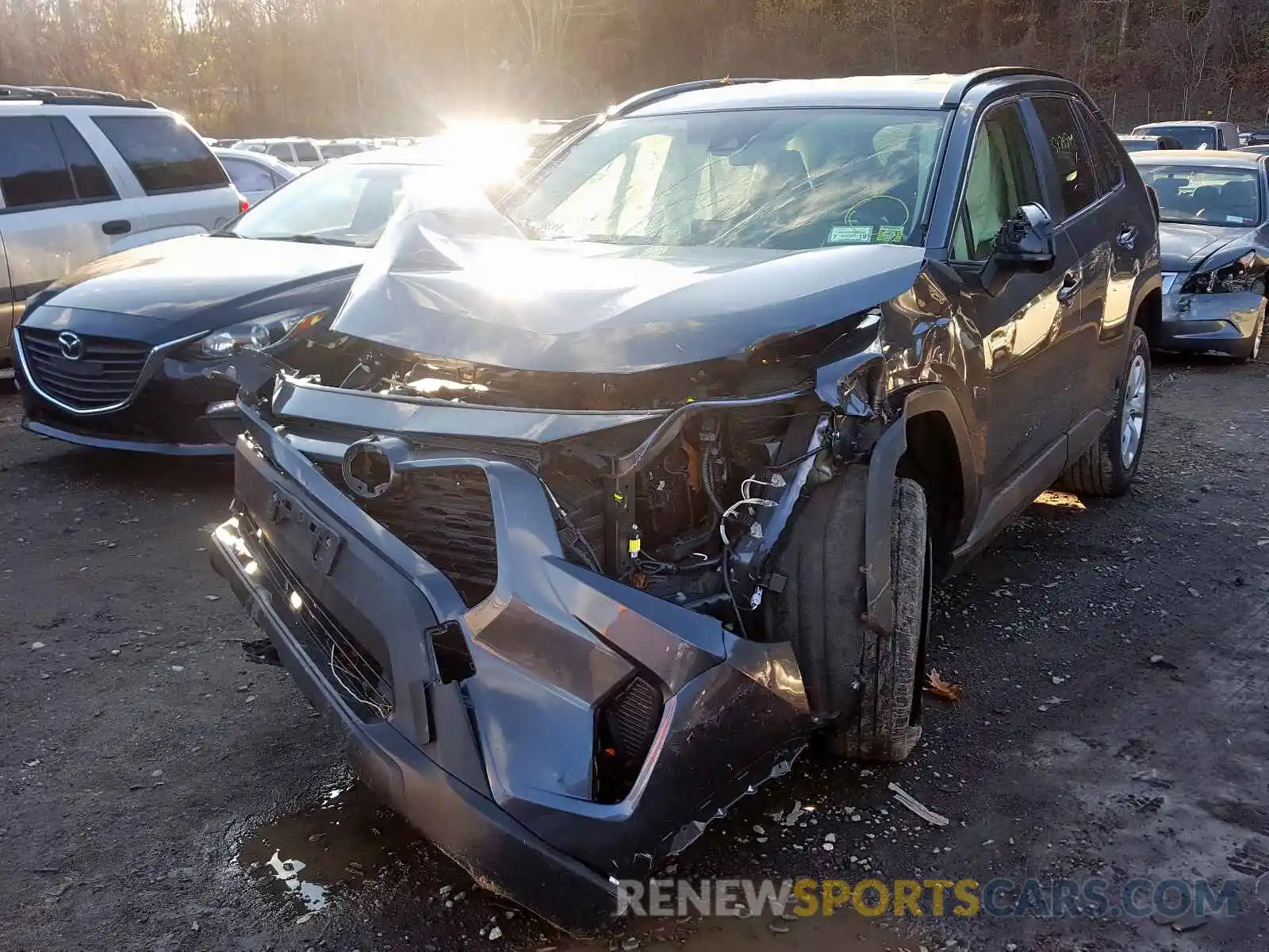 2 Photograph of a damaged car JTMF1RFV8KD002931 TOYOTA RAV4 LE 2019